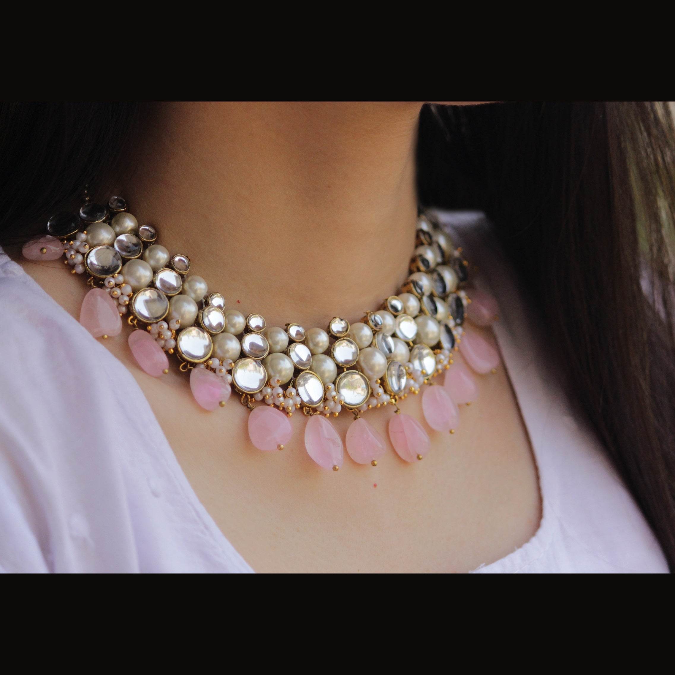 Kundan choker set in gold-tone with matching earrings and long bridal necklace, perfect for wedding functions , festive and bridal wear