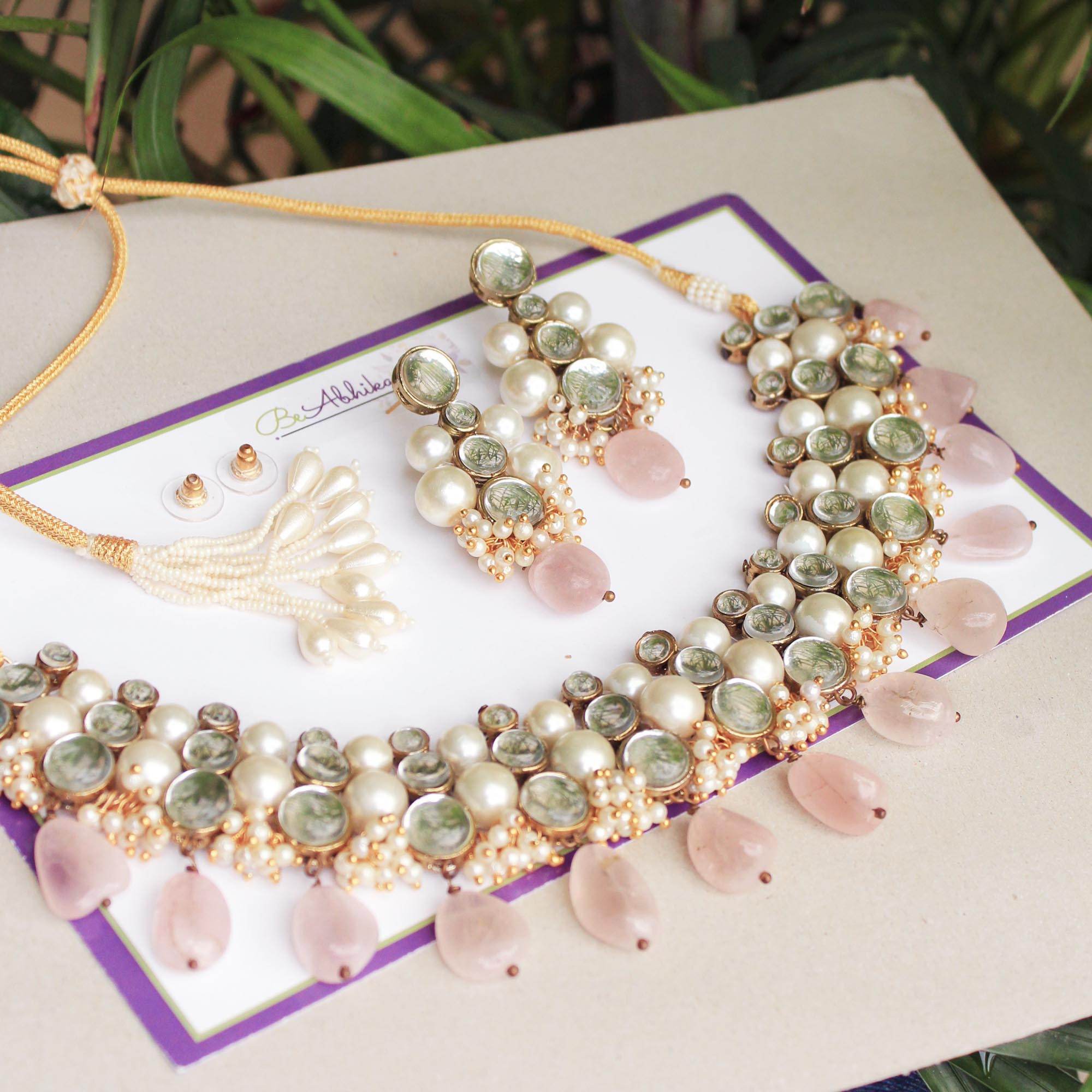 Kundan choker set in gold-tone with matching earrings and long bridal necklace, perfect for wedding functions , festive and bridal wear