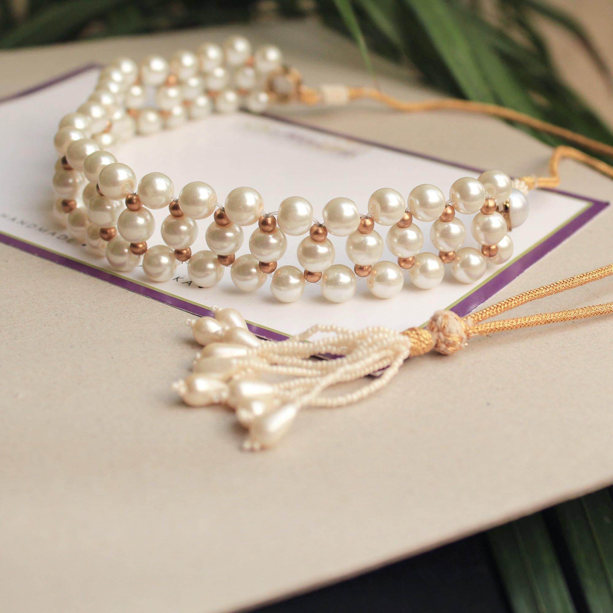 Kundan choker set in gold-tone with matching earrings and long bridal necklace, perfect for wedding functions , festive and bridal wear