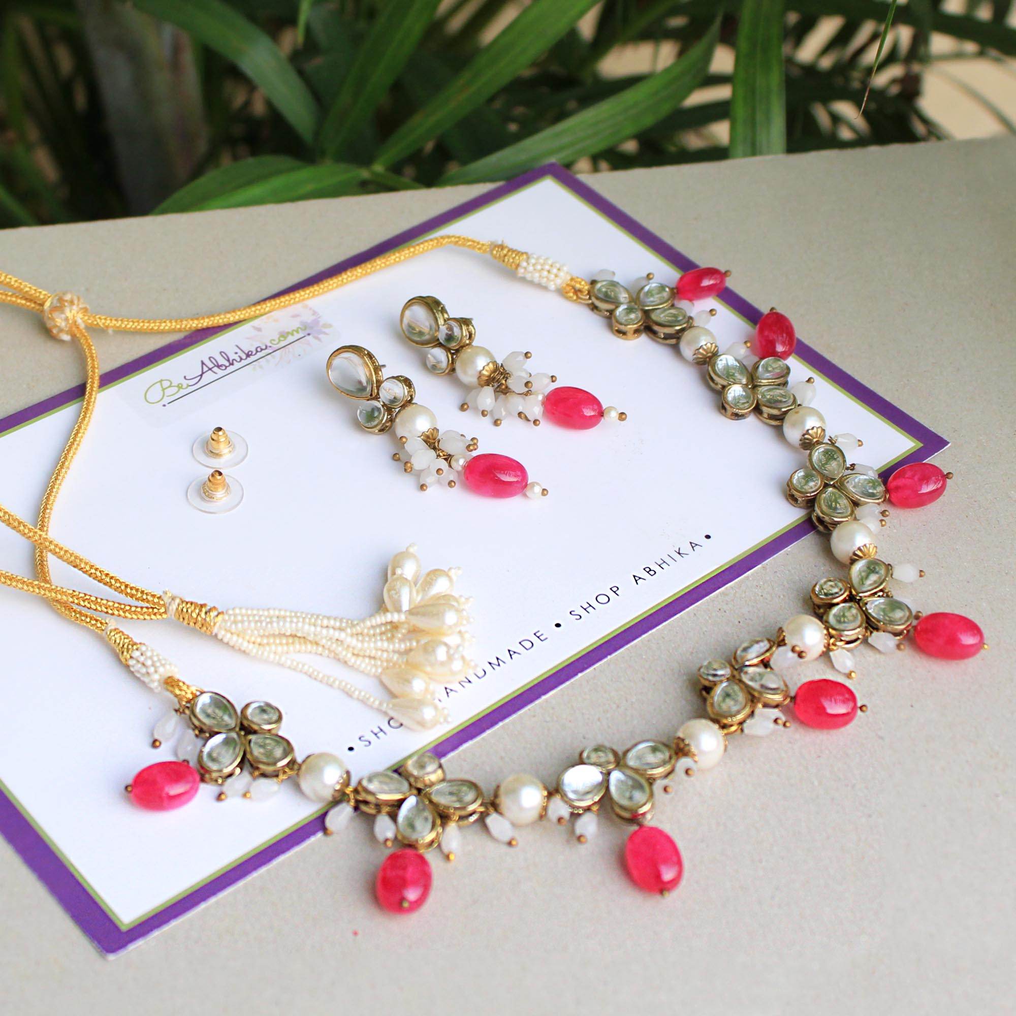 Kundan choker set in gold-tone with matching earrings and long bridal necklace, perfect for wedding functions , festive and bridal wear