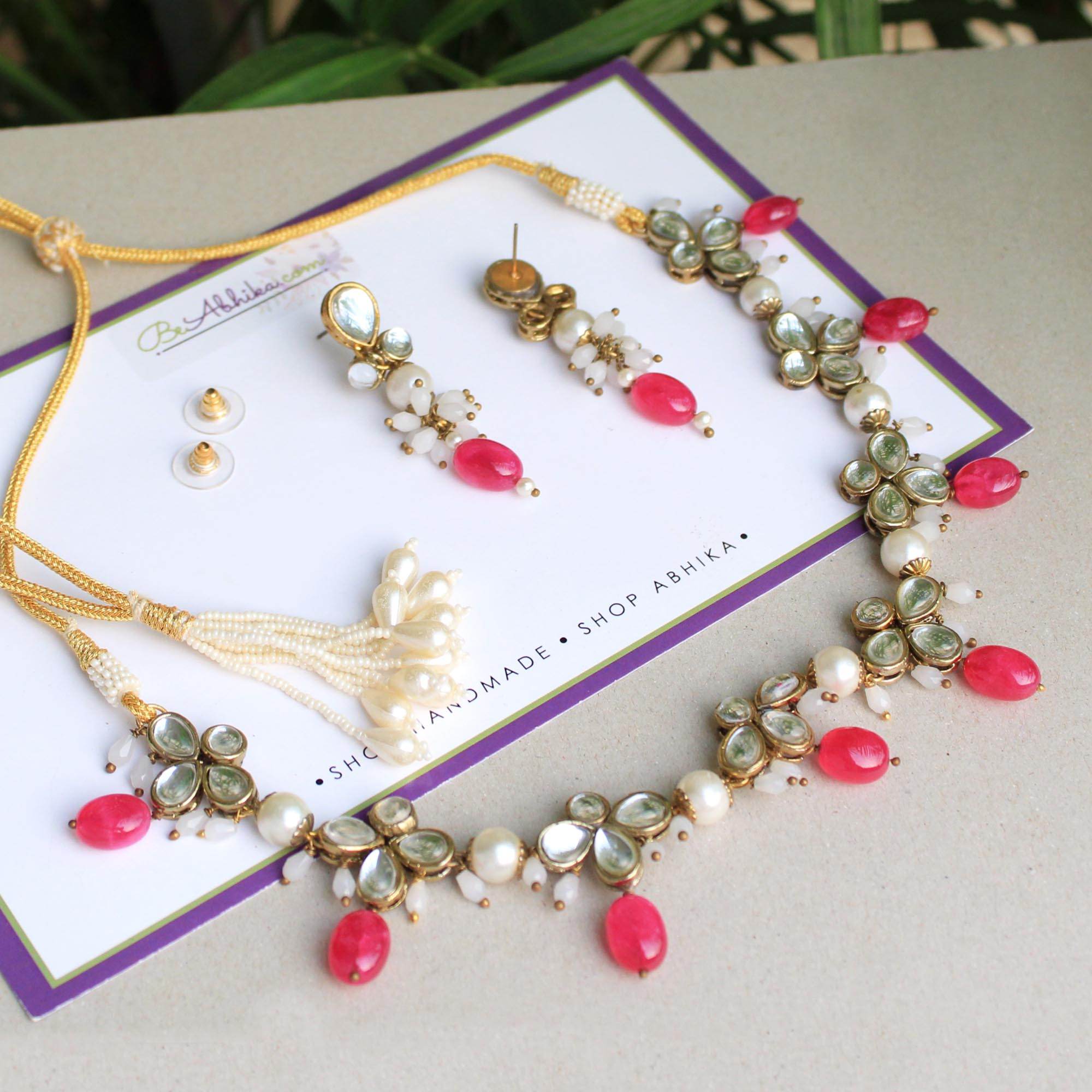 Kundan choker set in gold-tone with matching earrings and long bridal necklace, perfect for wedding functions , festive and bridal wear