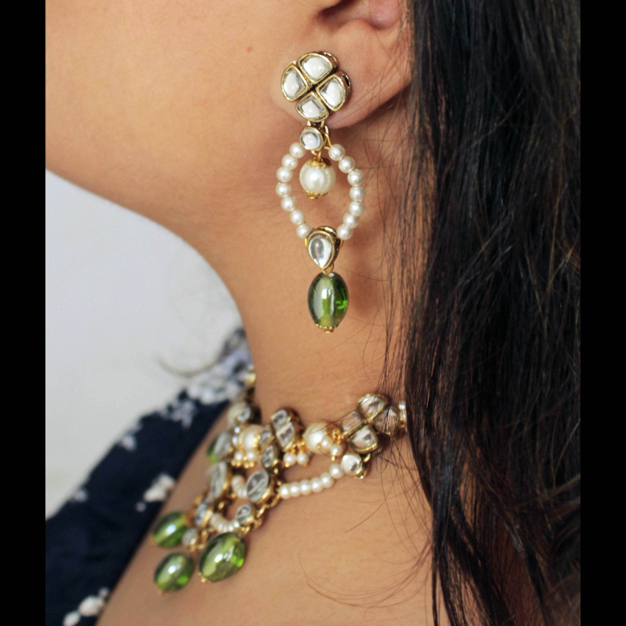 Kundan choker set in gold-tone with matching earrings and long bridal necklace, perfect for wedding functions , festive and bridal wear