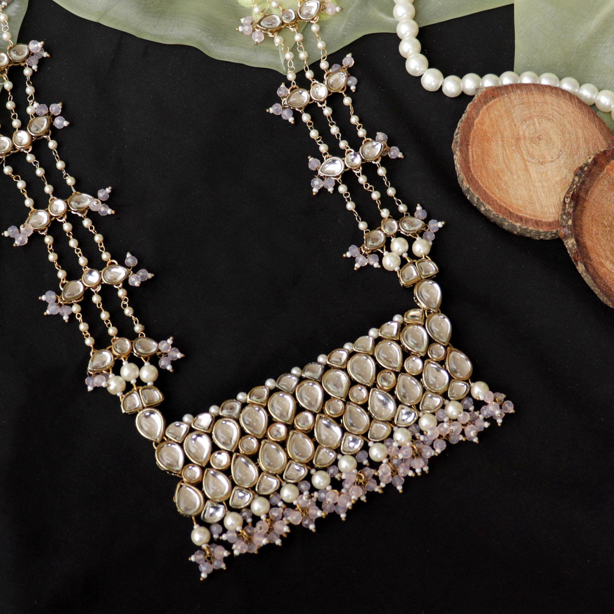 Kundan choker set in gold-tone with matching earrings and long bridal necklace, perfect for wedding functions , festive and bridal wear