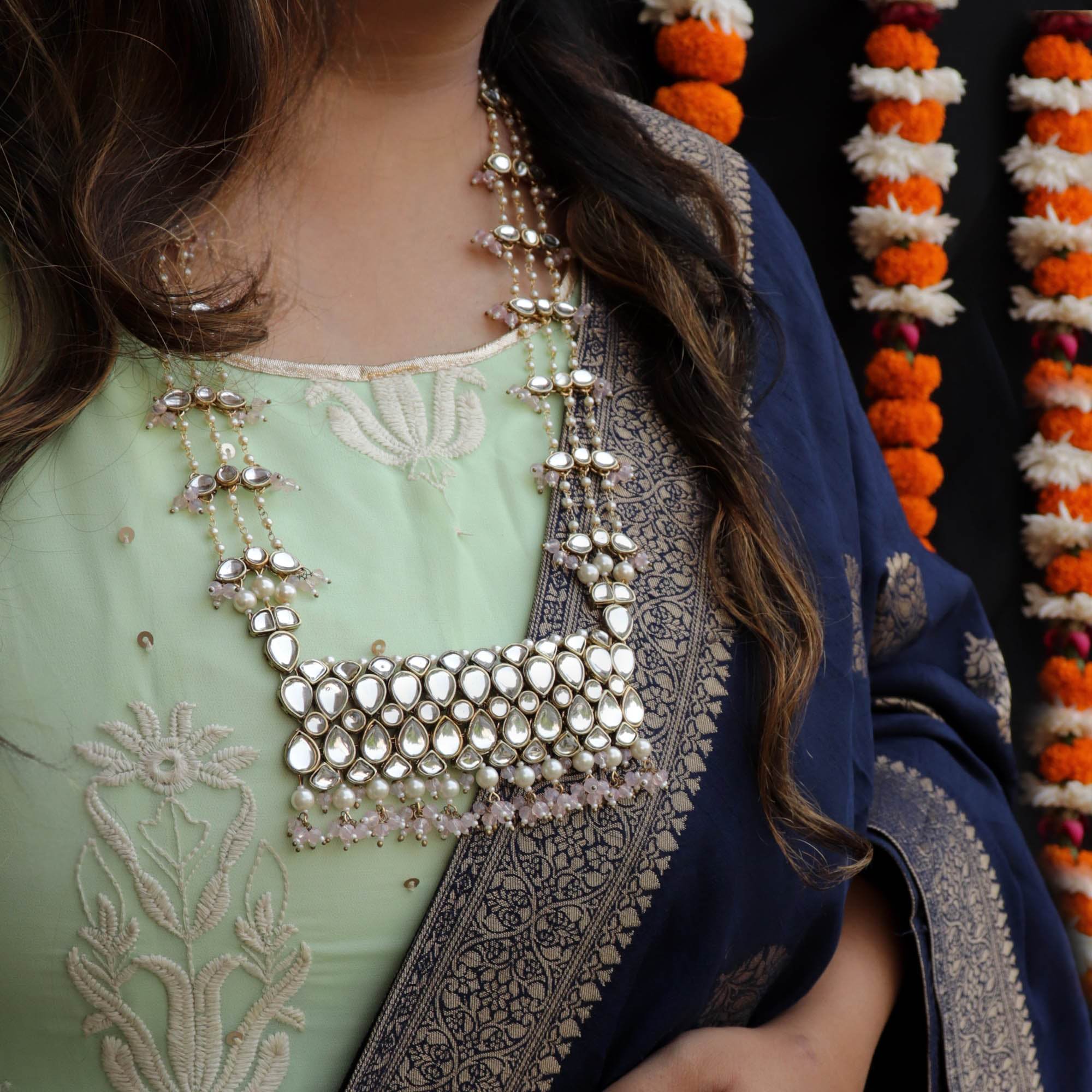 Kundan choker set in gold-tone with matching earrings and long bridal necklace, perfect for wedding functions , festive and bridal wear