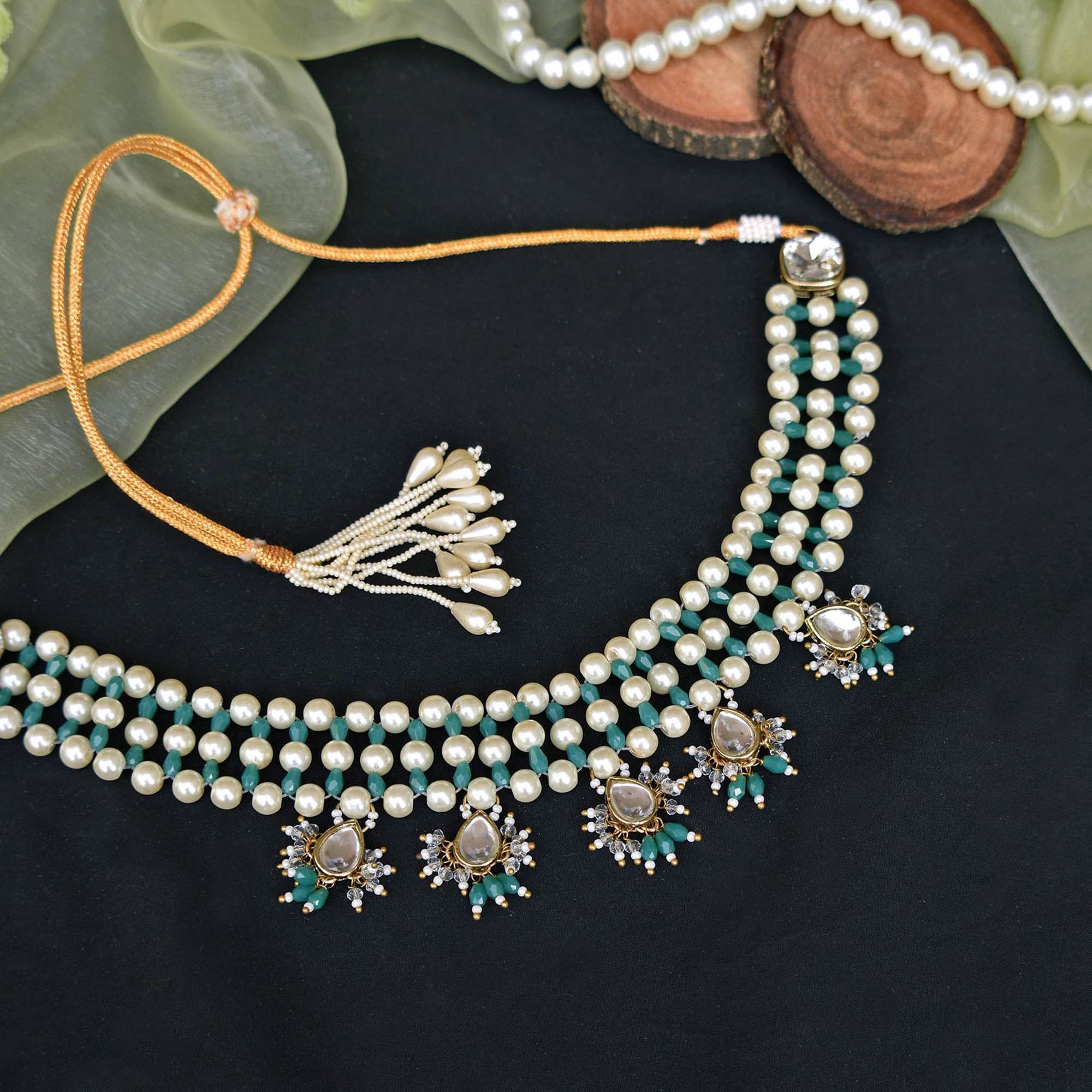 Kundan choker set in gold-tone with matching earrings and long bridal necklace, perfect for wedding functions , festive and bridal wear
