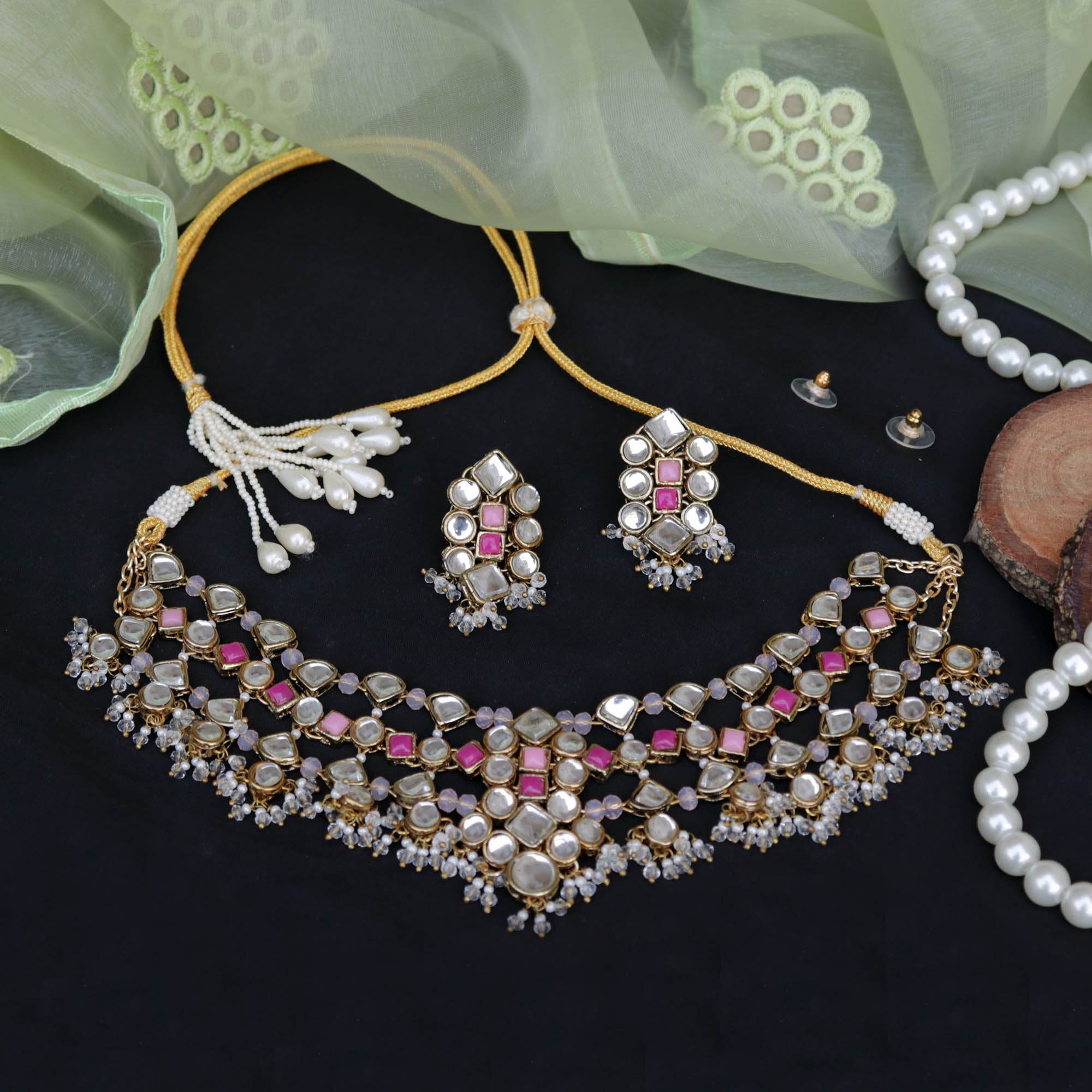 Kundan choker set in gold-tone with matching earrings and long bridal necklace, perfect for wedding functions , festive and bridal wear