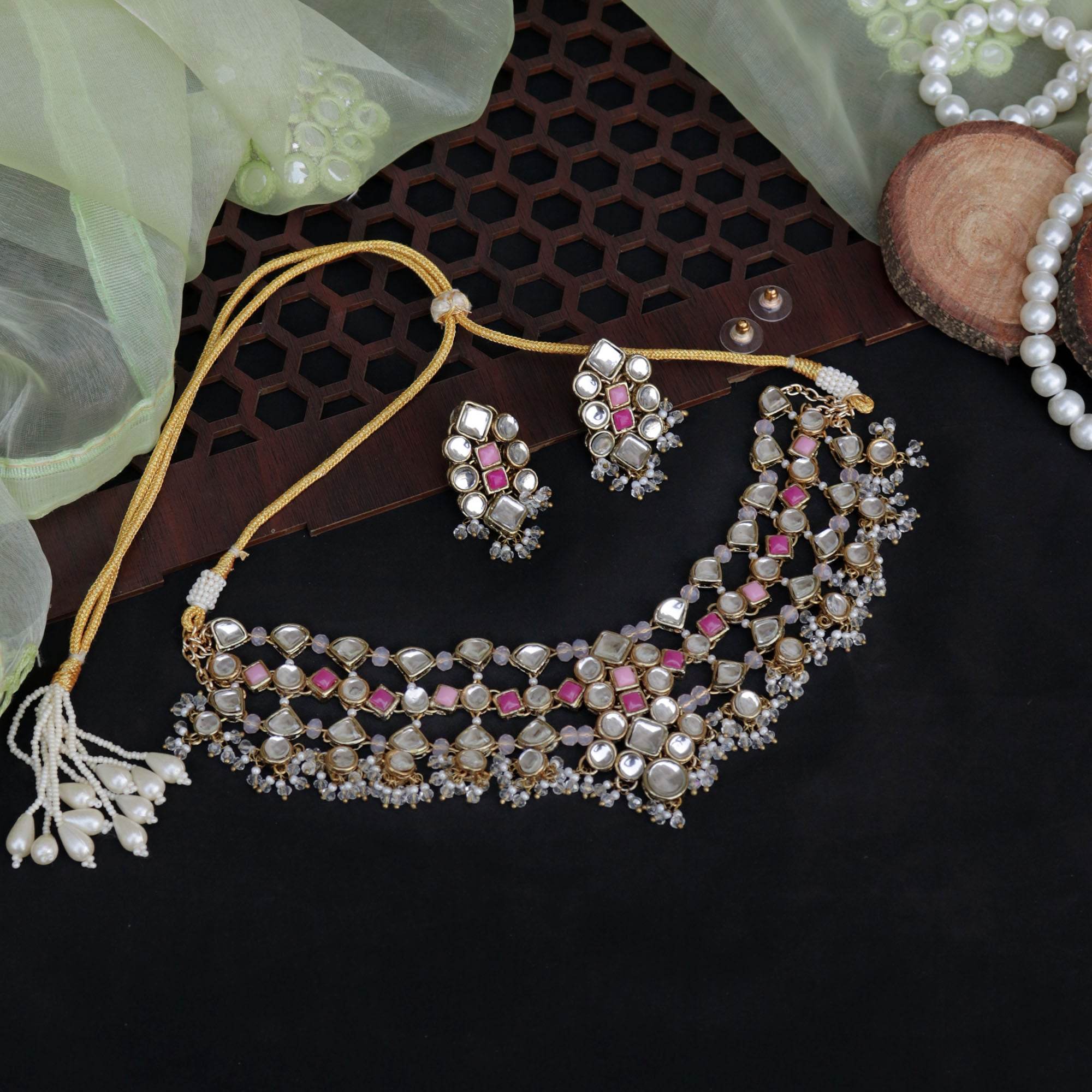 Kundan choker set in gold-tone with matching earrings and long bridal necklace, perfect for wedding functions , festive and bridal wear