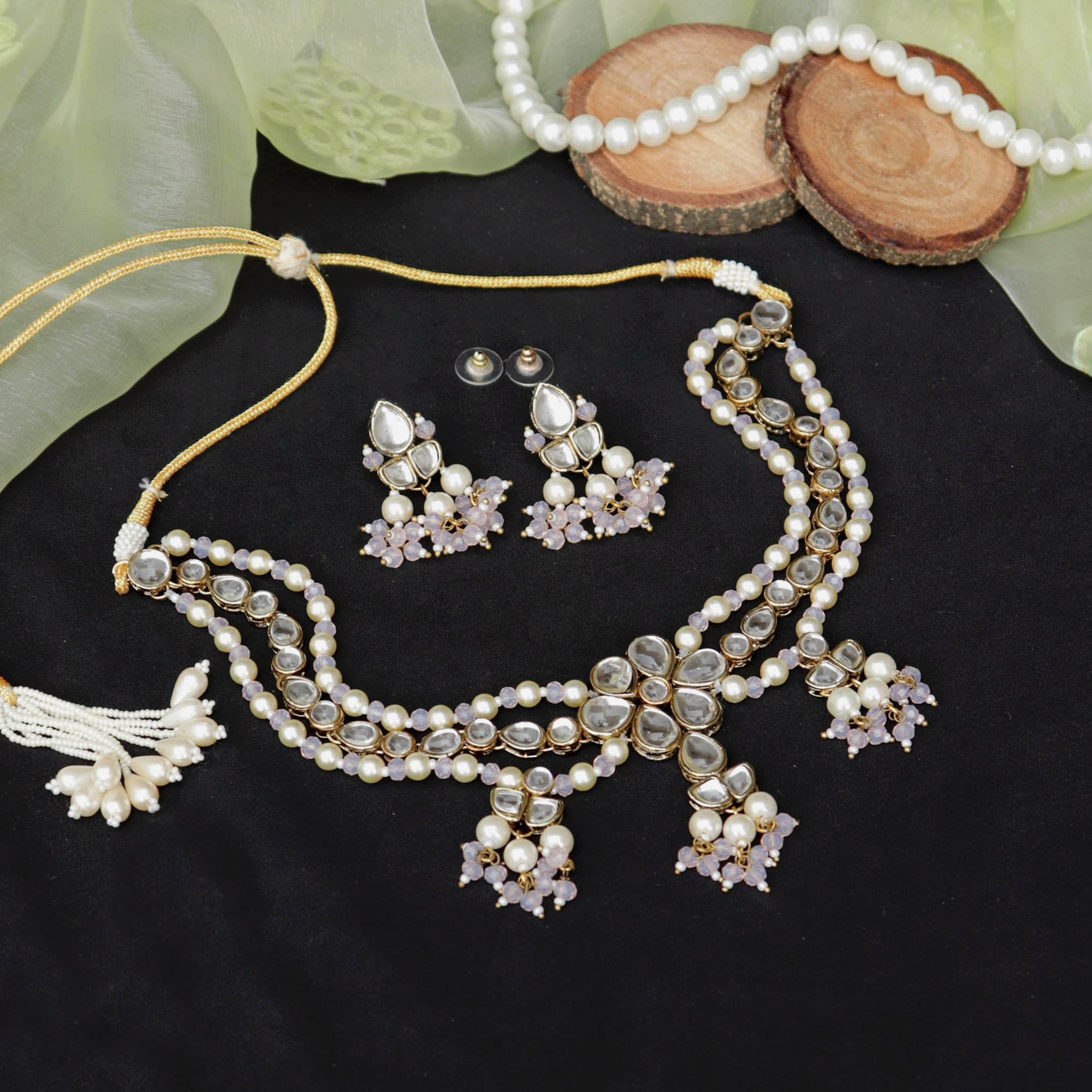 Kundan choker set in gold-tone with matching earrings and long bridal necklace, perfect for wedding functions , festive and bridal wear