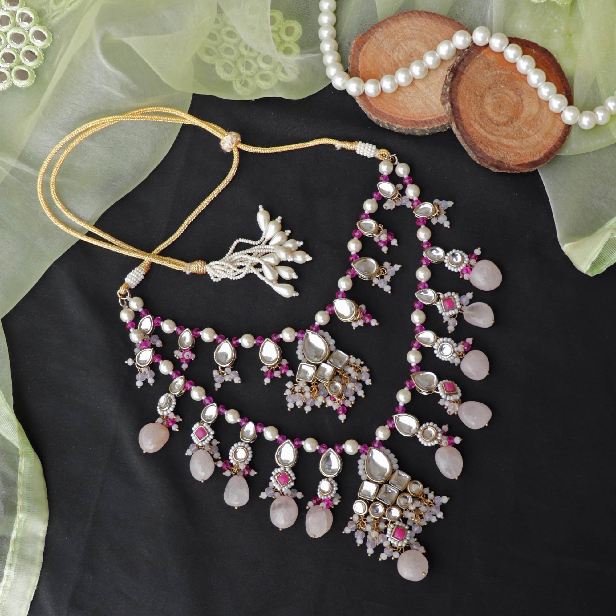 Kundan choker set in gold-tone with matching earrings and long bridal necklace, perfect for wedding functions , festive and bridal wear