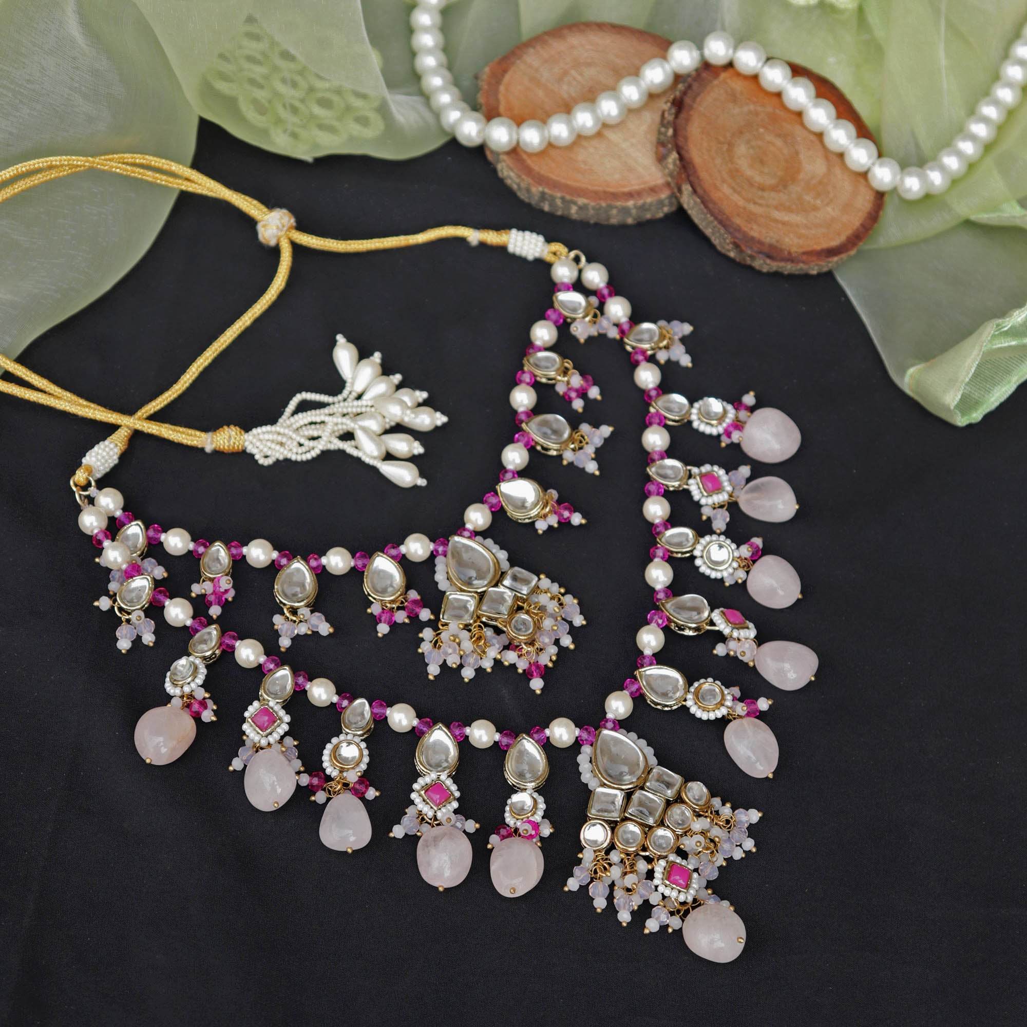 Kundan choker set in gold-tone with matching earrings and long bridal necklace, perfect for wedding functions , festive and bridal wear