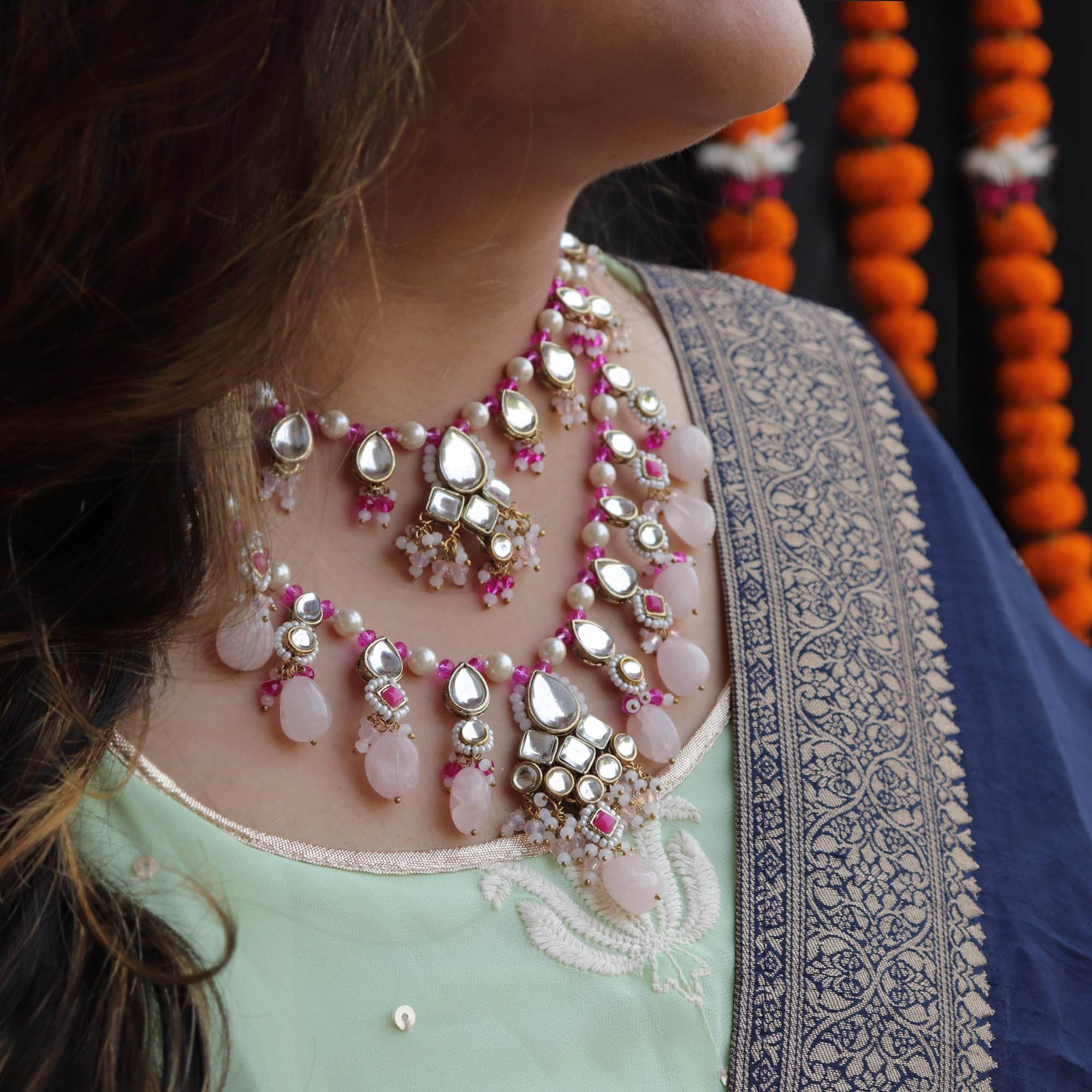 Kundan choker set in gold-tone with matching earrings and long bridal necklace, perfect for wedding functions , festive and bridal wear
