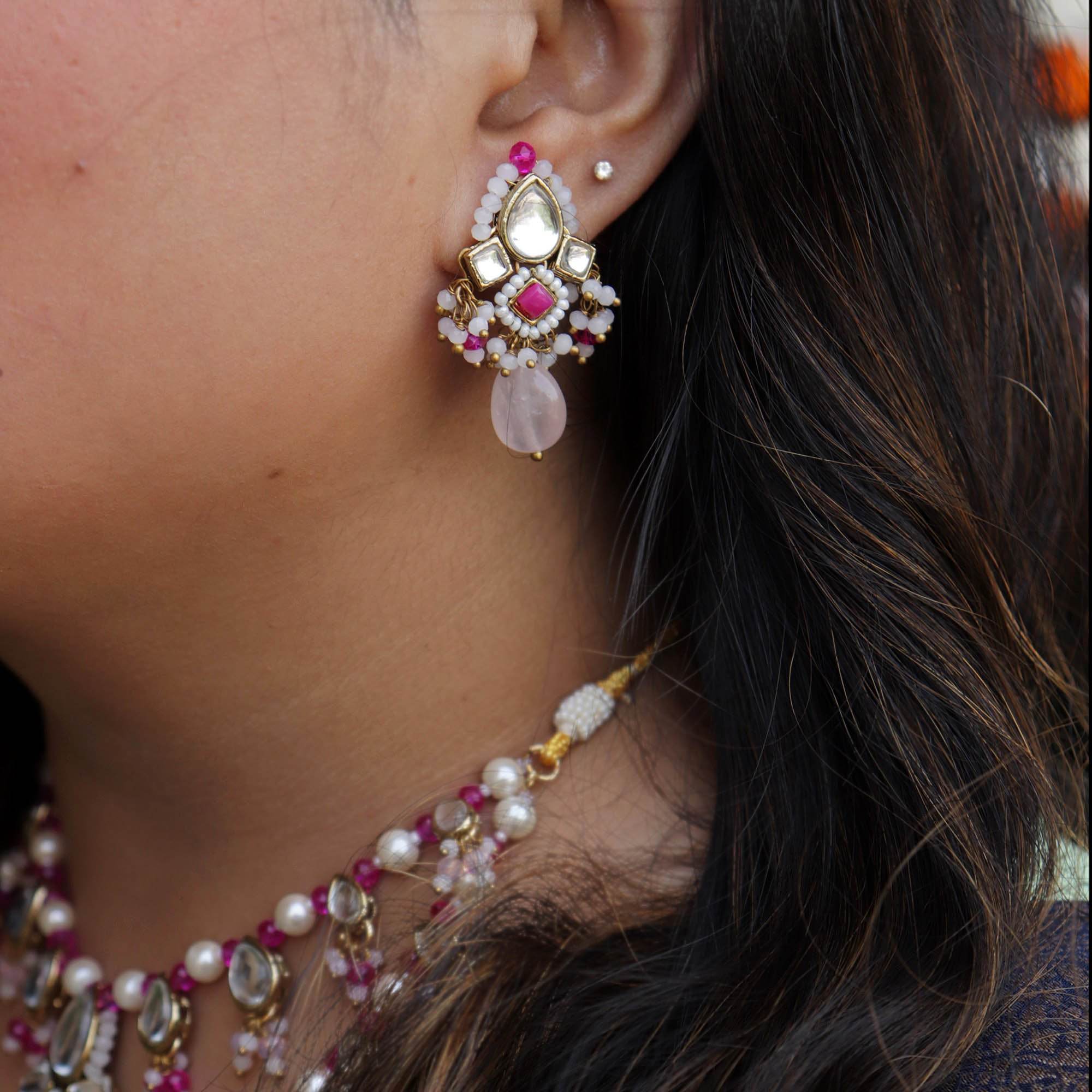 Kundan choker set in gold-tone with matching earrings and long bridal necklace, perfect for wedding functions , festive and bridal wear