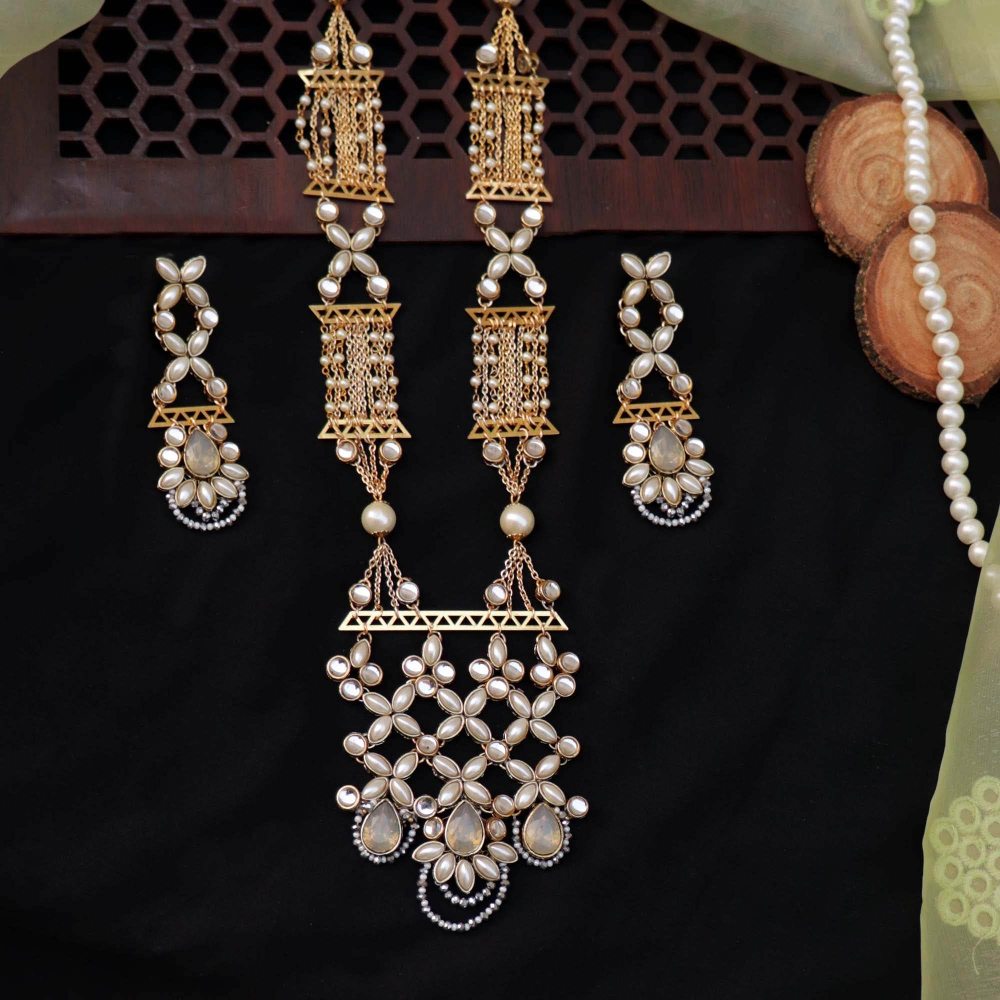 Kundan choker set in gold-tone with matching earrings and long bridal necklace, perfect for wedding functions , festive and bridal wear