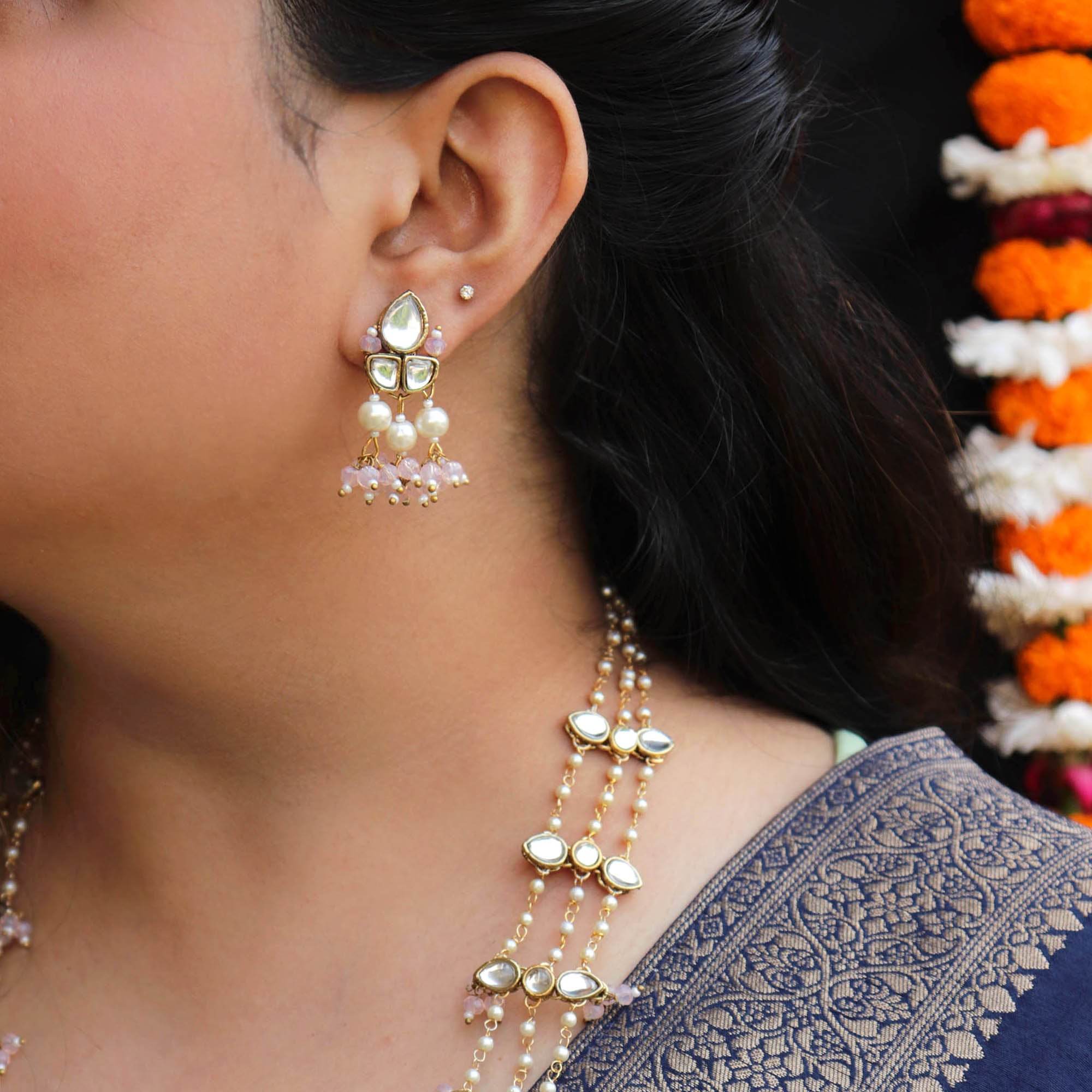 Kundan choker set in gold-tone with matching earrings and long bridal necklace, perfect for wedding functions , festive and bridal wear