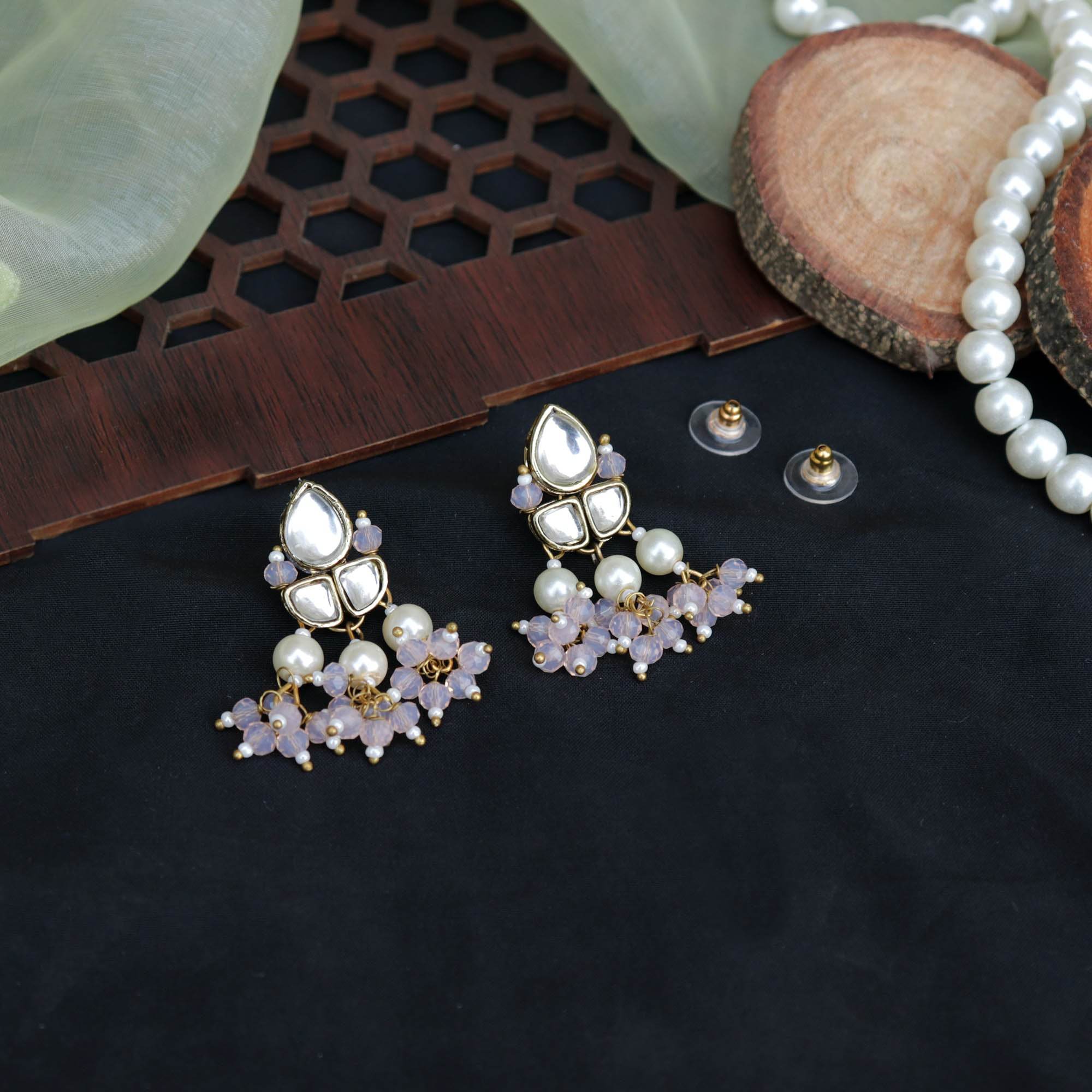 Kundan choker set in gold-tone with matching earrings and long bridal necklace, perfect for wedding functions , festive and bridal wear
