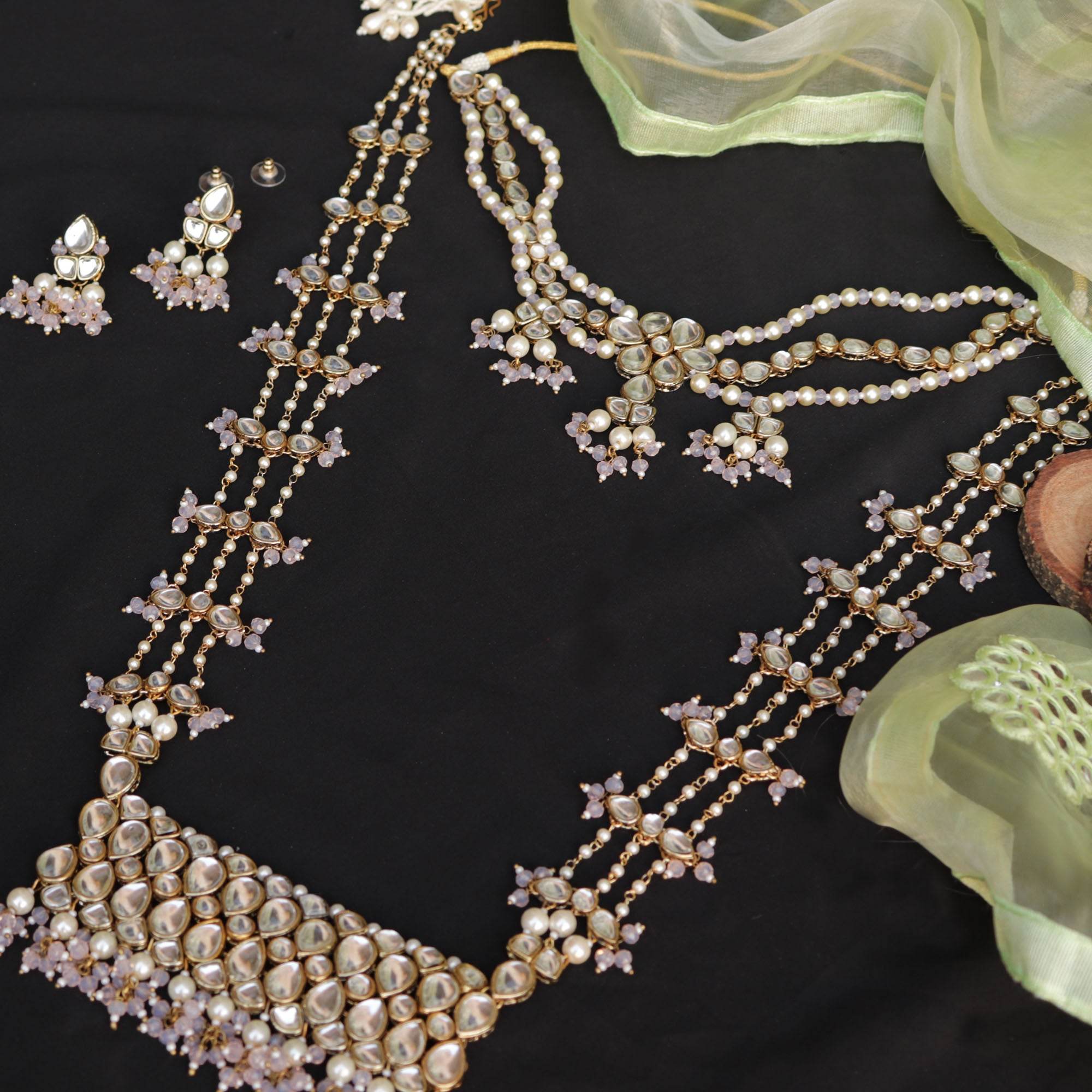 Kundan choker set in gold-tone with matching earrings and long bridal necklace, perfect for wedding functions , festive and bridal wear