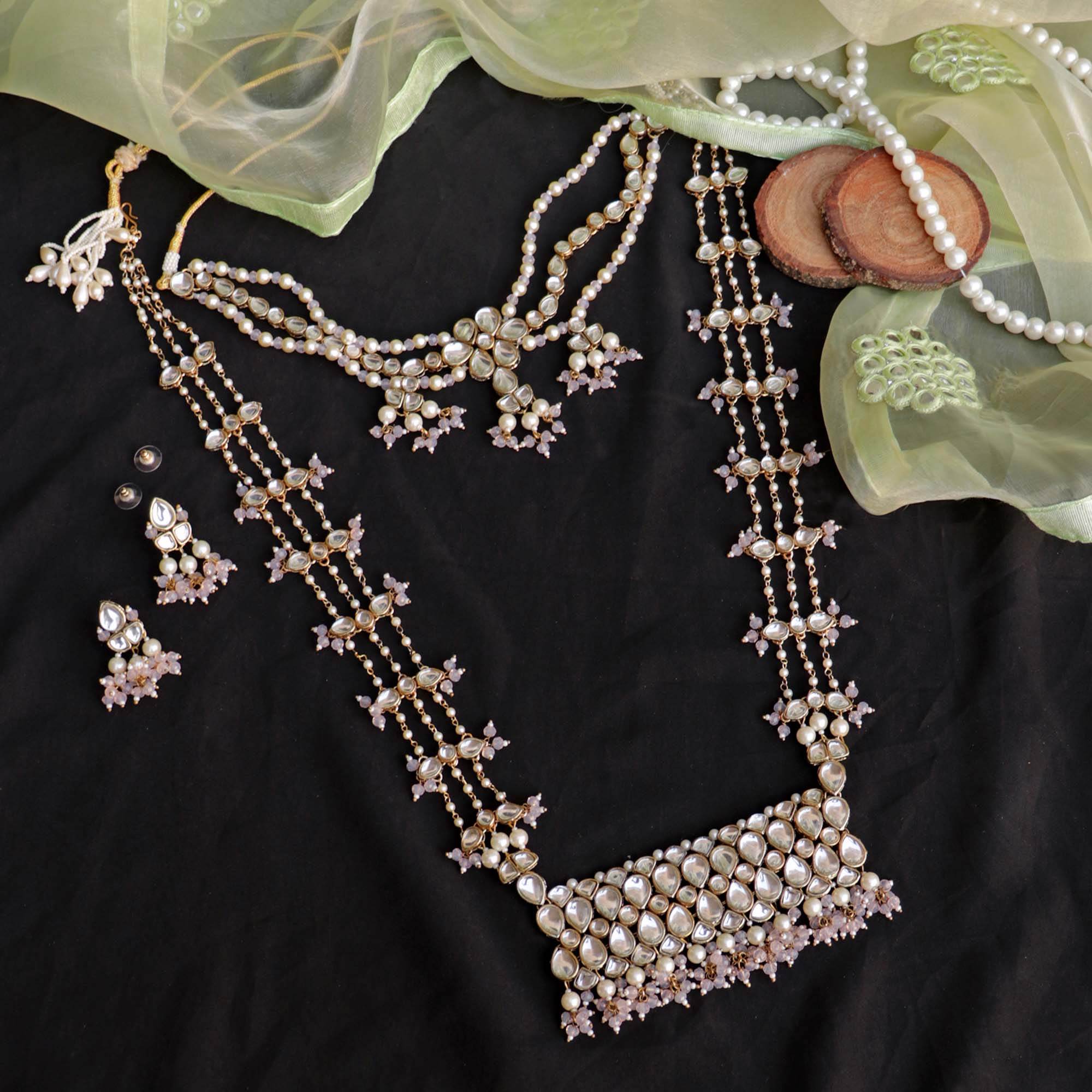 Kundan choker set in gold-tone with matching earrings and long bridal necklace, perfect for wedding functions , festive and bridal wear