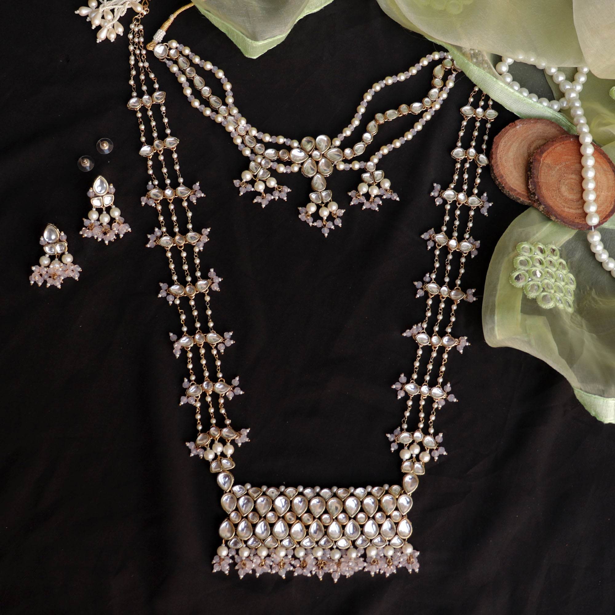 Kundan choker set in gold-tone with matching earrings and long bridal necklace, perfect for wedding functions , festive and bridal wear