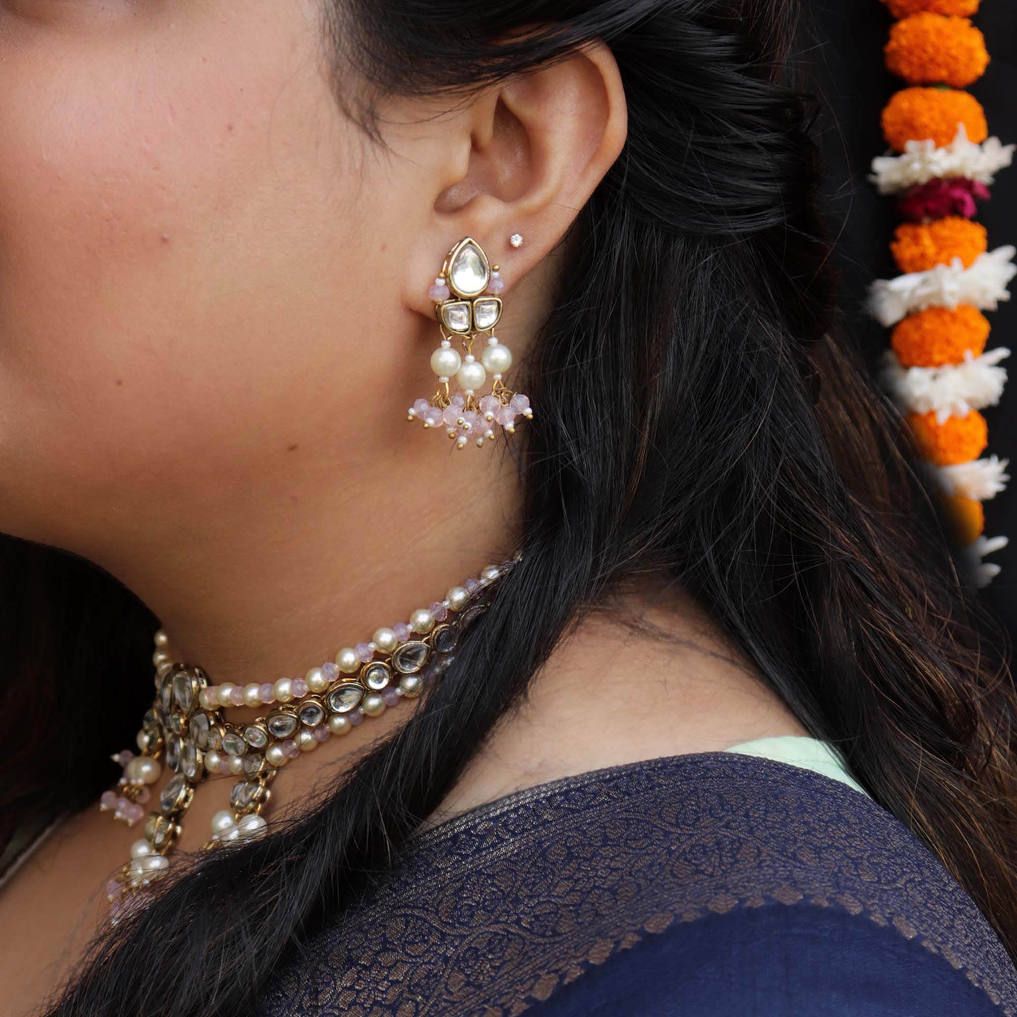 Kundan choker set in gold-tone with matching earrings and long bridal necklace, perfect for wedding functions , festive and bridal wear