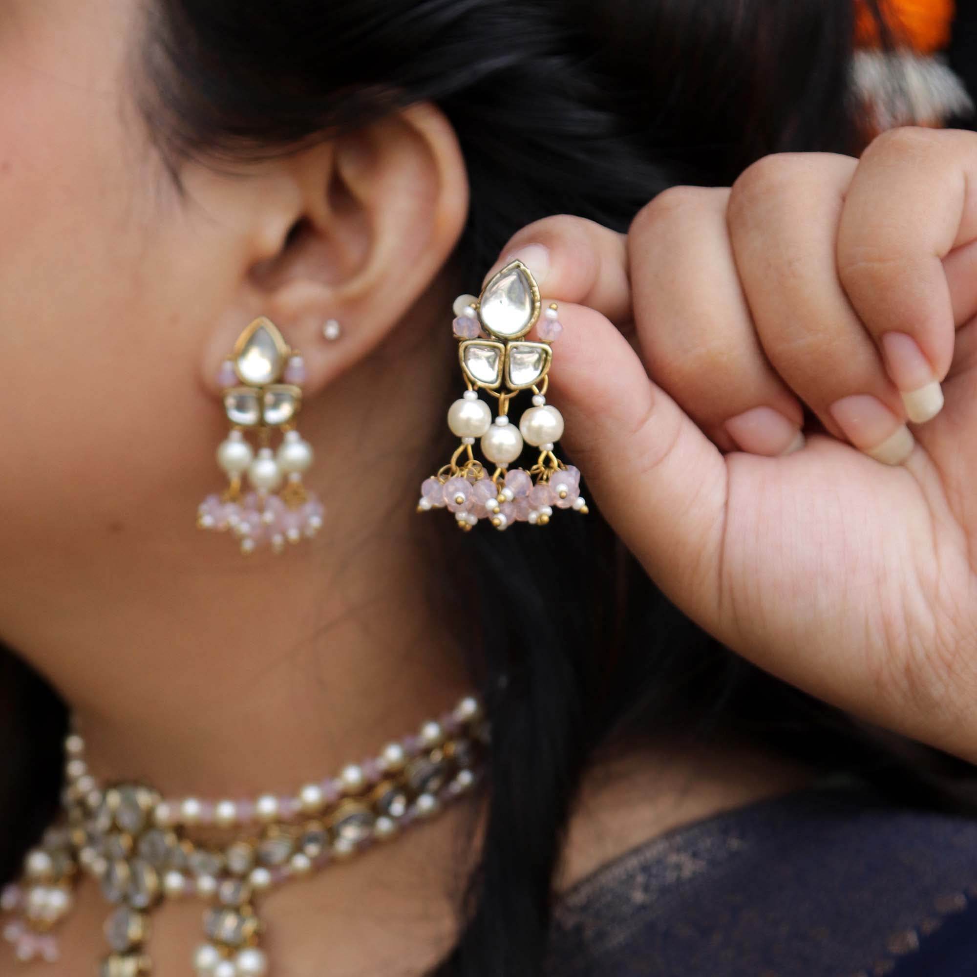 Kundan choker set in gold-tone with matching earrings and long bridal necklace, perfect for wedding functions , festive and bridal wear