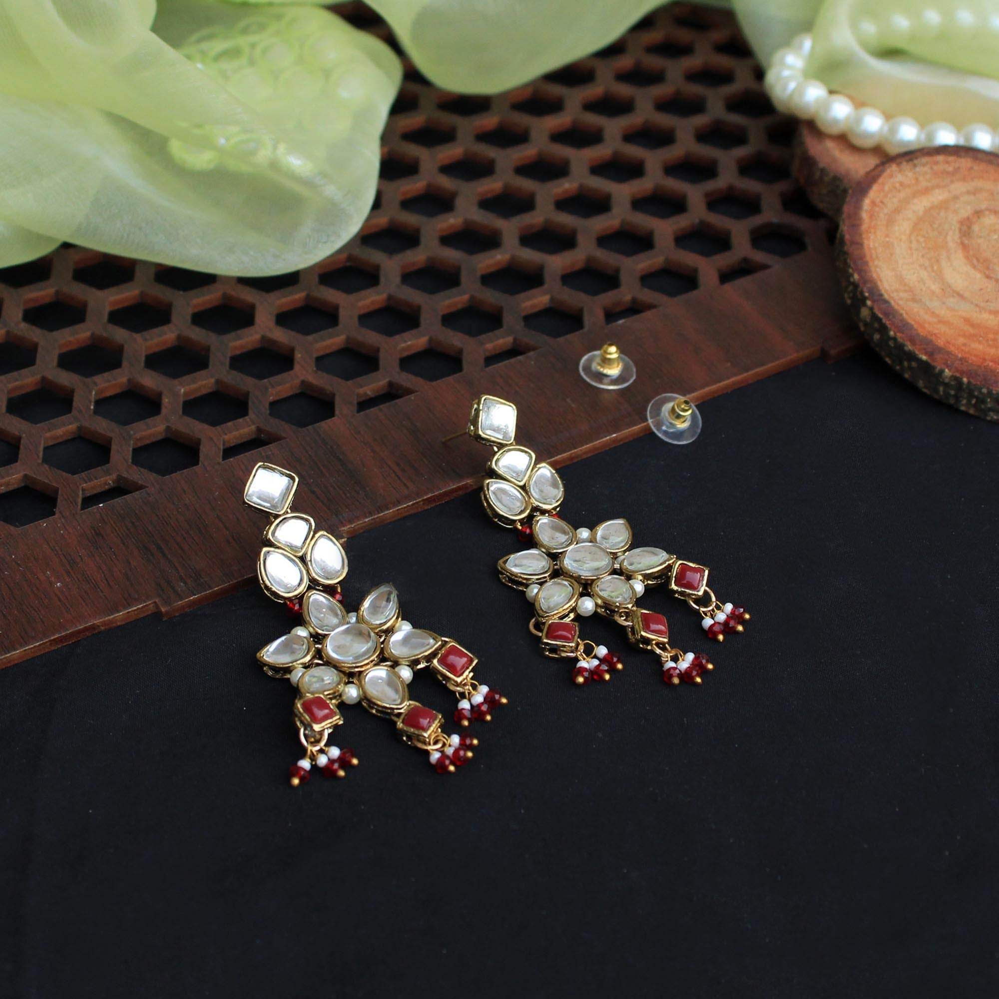 Kundan choker set in gold-tone with matching earrings and long bridal necklace, perfect for wedding functions , festive and bridal wear