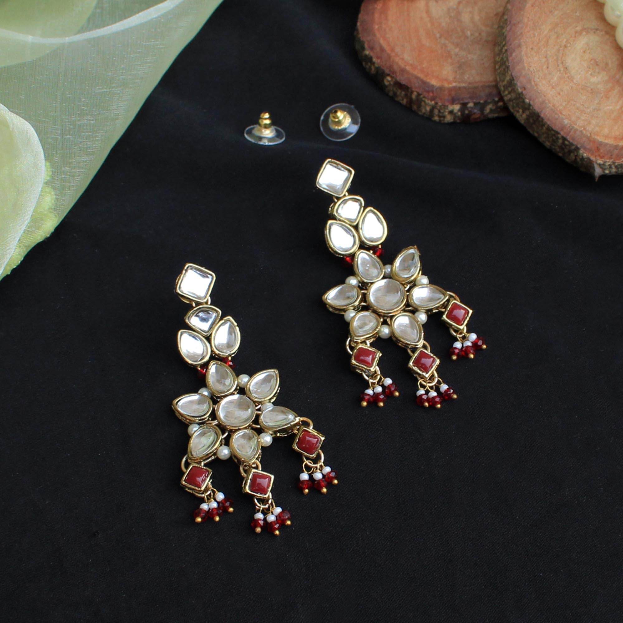 Kundan choker set in gold-tone with matching earrings and long bridal necklace, perfect for wedding functions , festive and bridal wear