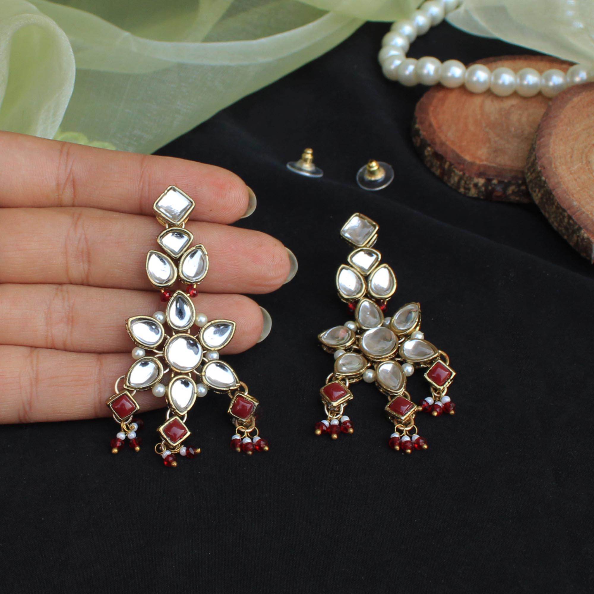 Kundan choker set in gold-tone with matching earrings and long bridal necklace, perfect for wedding functions , festive and bridal wear