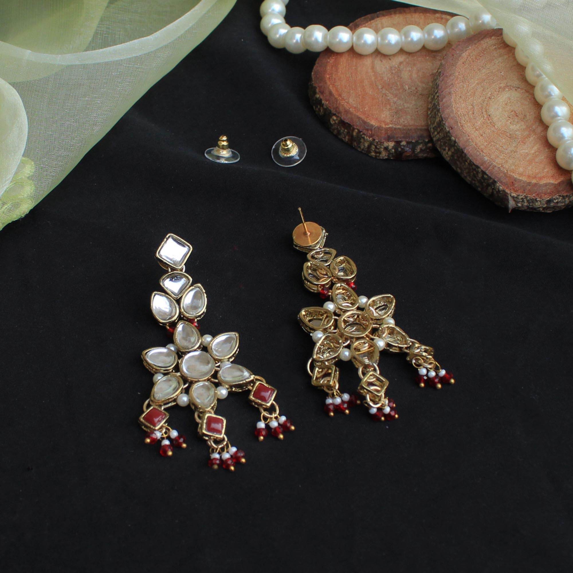 Kundan choker set in gold-tone with matching earrings and long bridal necklace, perfect for wedding functions , festive and bridal wear
