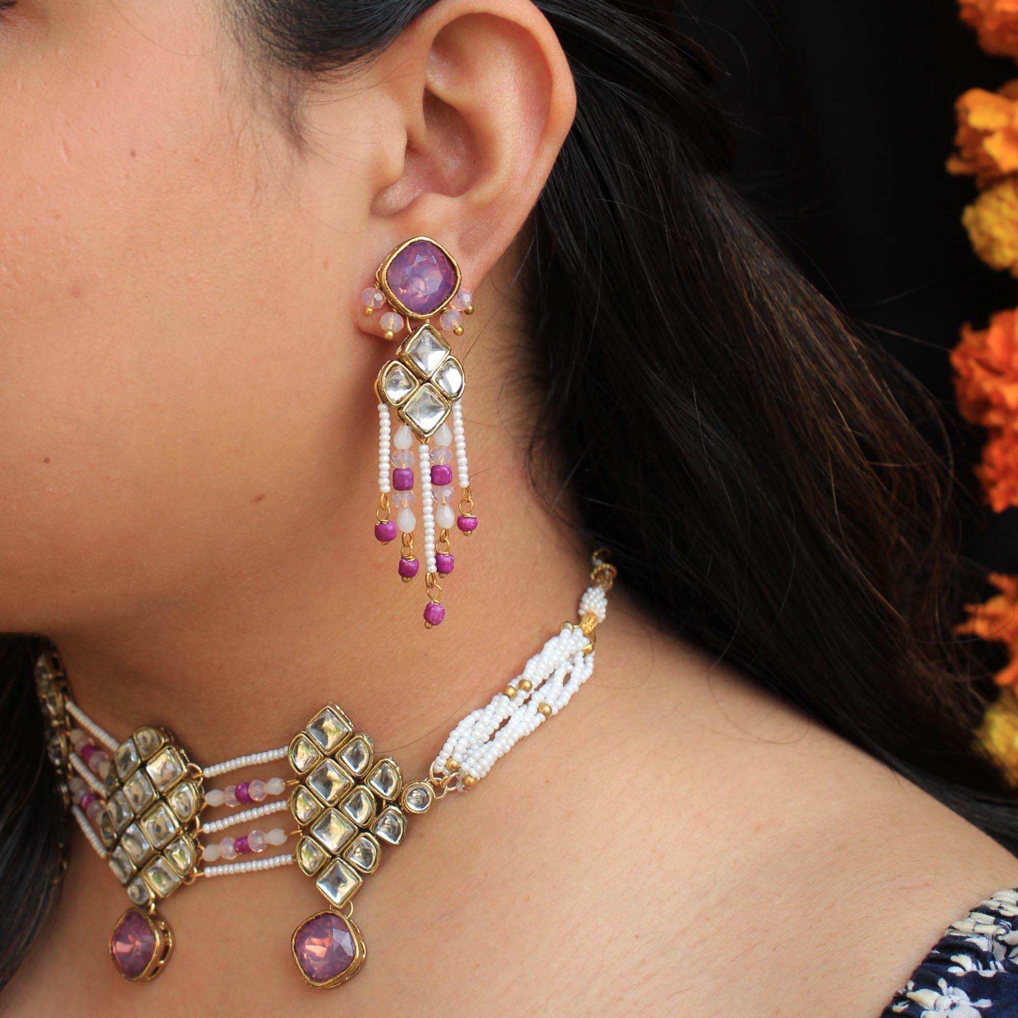Kundan choker set in gold-tone with matching earrings and long bridal necklace, perfect for wedding functions , festive and bridal wear