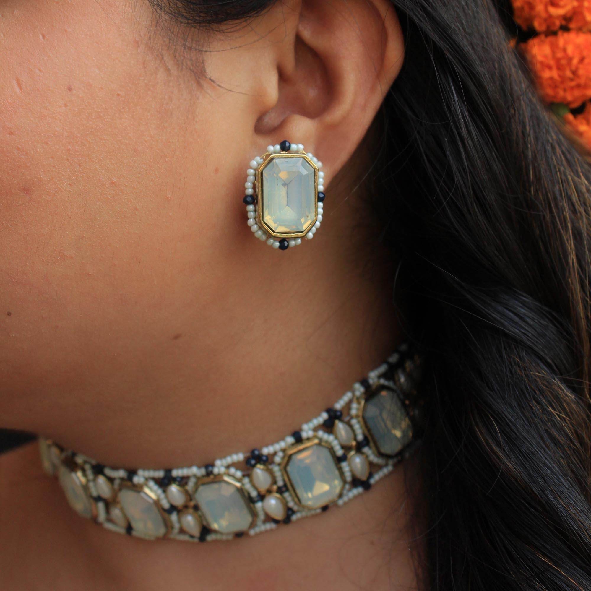 Kundan choker set in gold-tone with matching earrings and long bridal necklace, perfect for wedding functions , festive and bridal wear