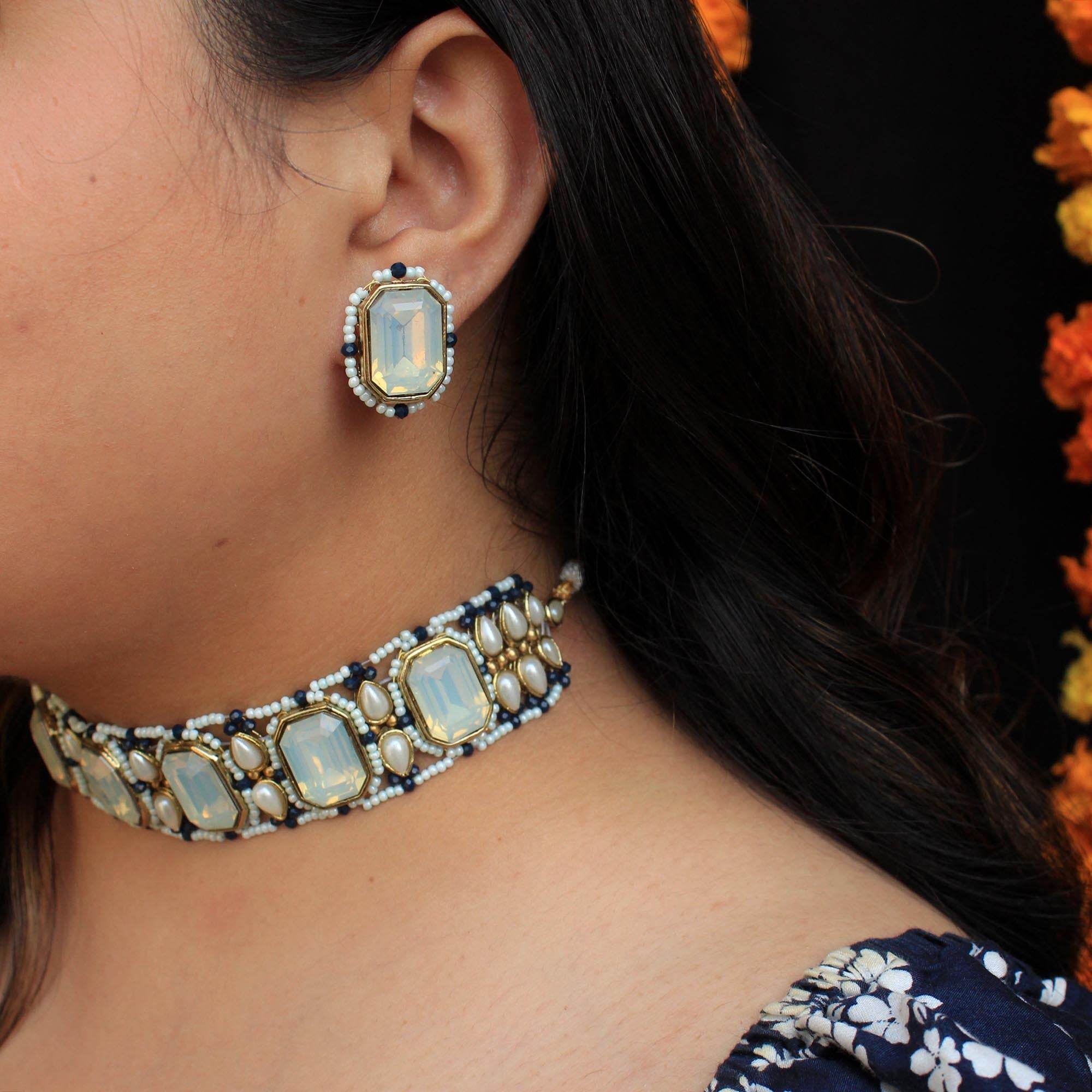 Kundan choker set in gold-tone with matching earrings and long bridal necklace, perfect for wedding functions , festive and bridal wear