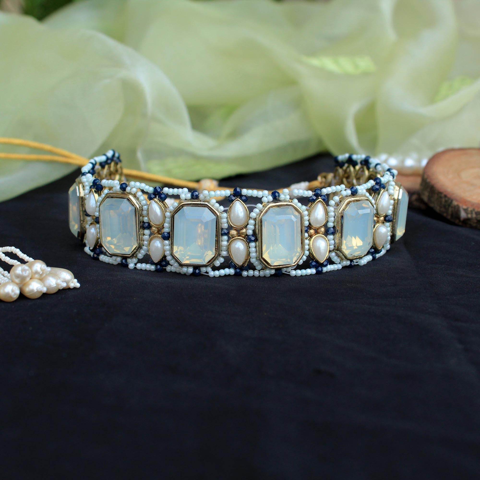 Kundan choker set in gold-tone with matching earrings and long bridal necklace, perfect for wedding functions , festive and bridal wear