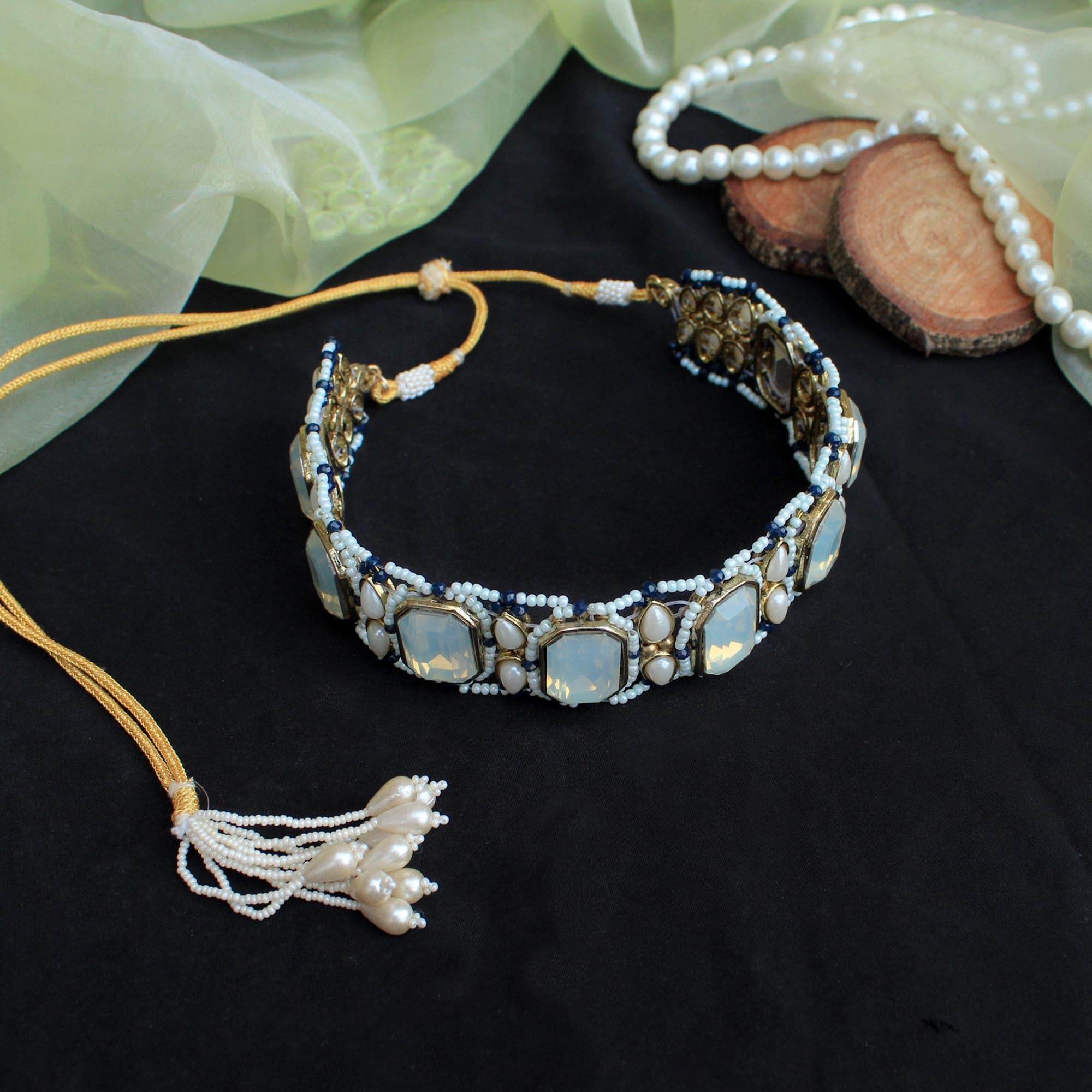 Kundan choker set in gold-tone with matching earrings and long bridal necklace, perfect for wedding functions , festive and bridal wear