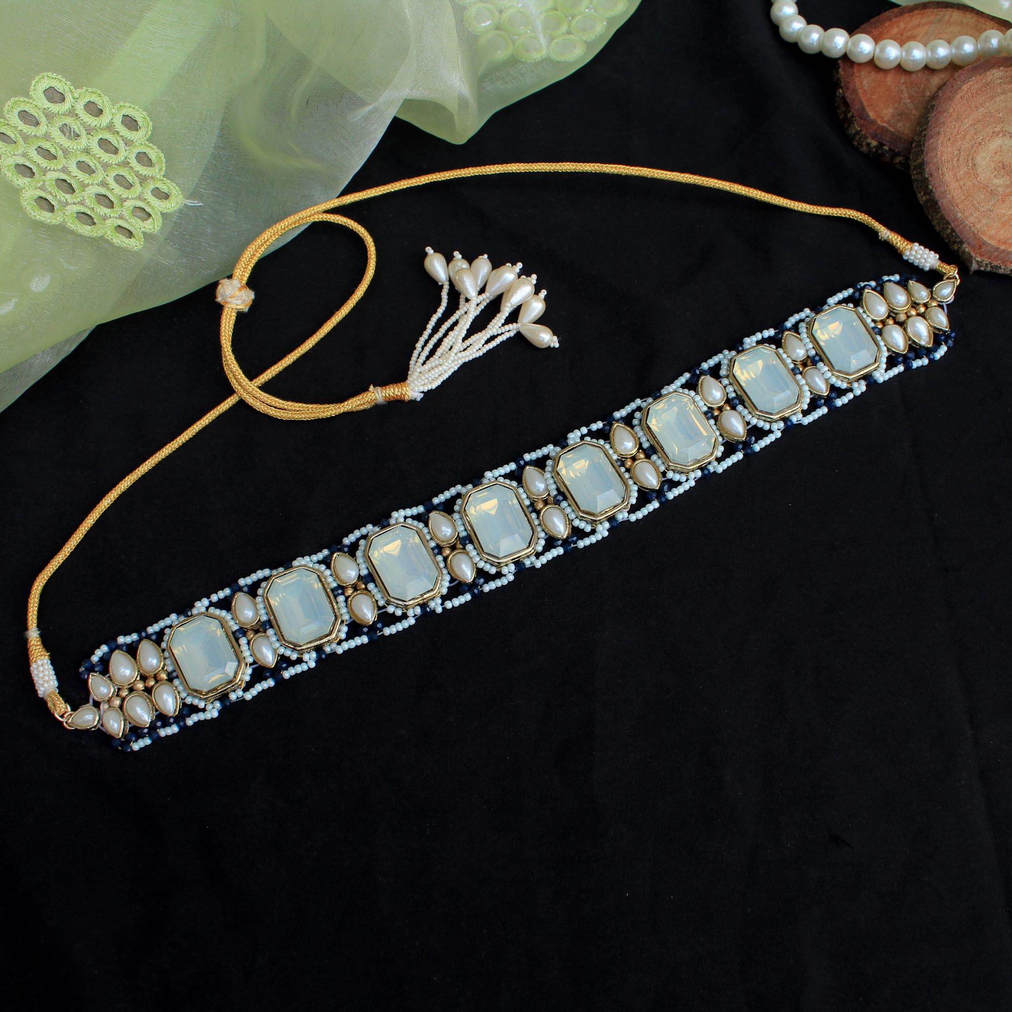 Kundan choker set in gold-tone with matching earrings and long bridal necklace, perfect for wedding functions , festive and bridal wear