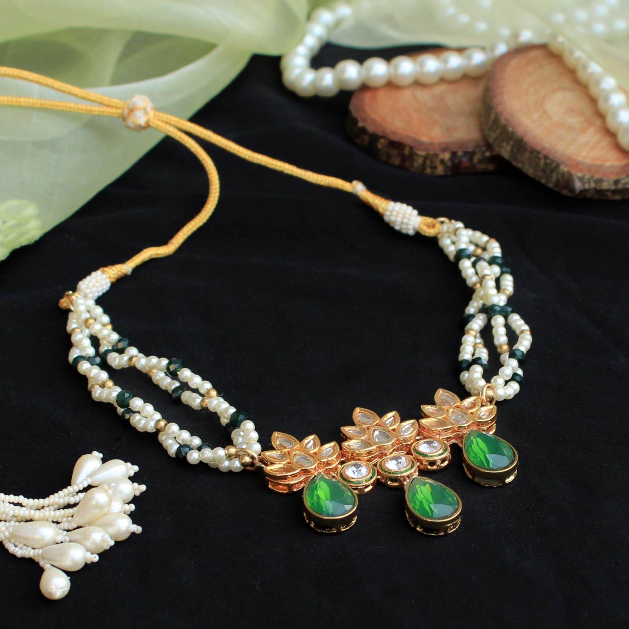 Kundan choker set in gold-tone with matching earrings and long bridal necklace, perfect for wedding functions , festive and bridal wear