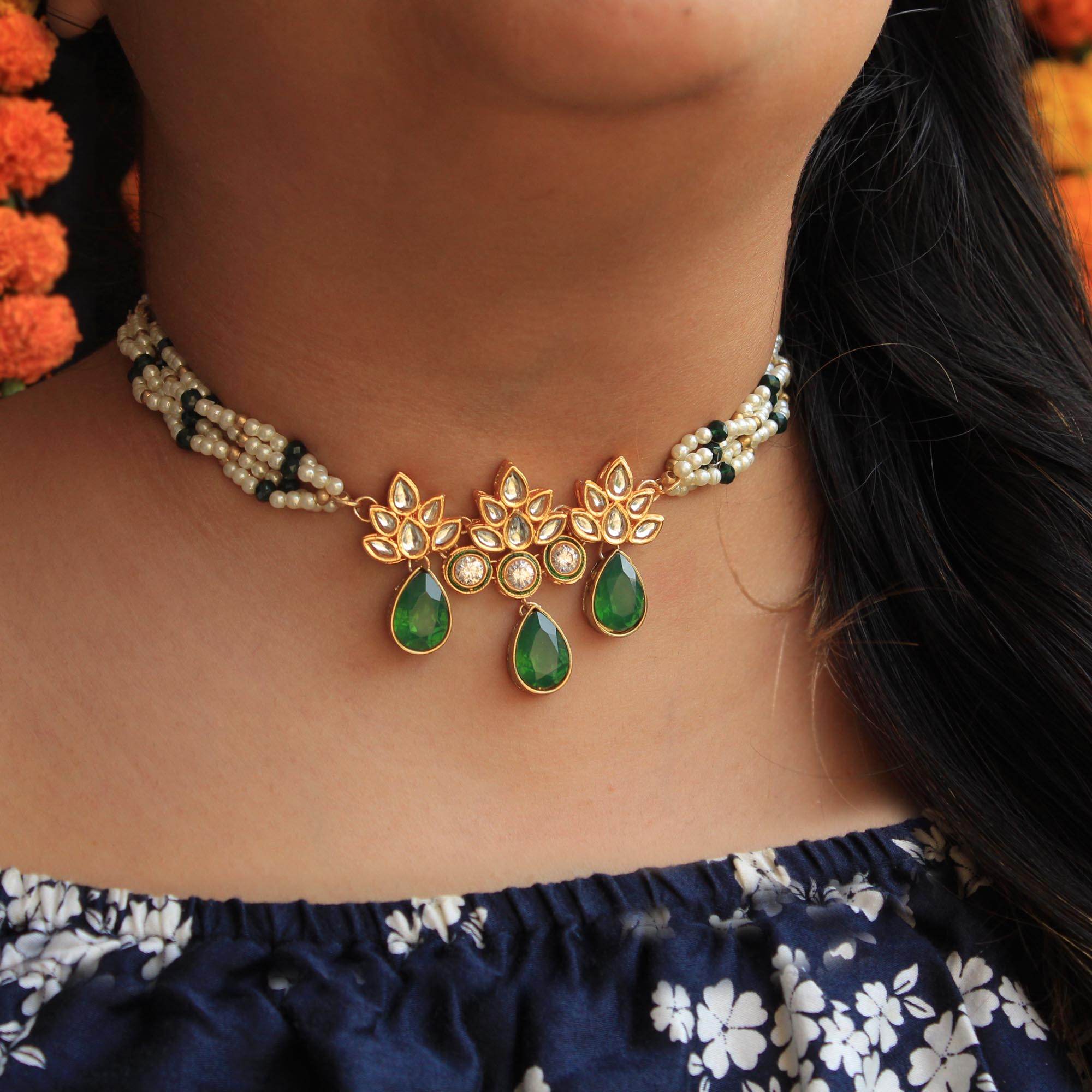 Kundan choker set in gold-tone with matching earrings and long bridal necklace, perfect for wedding functions , festive and bridal wear