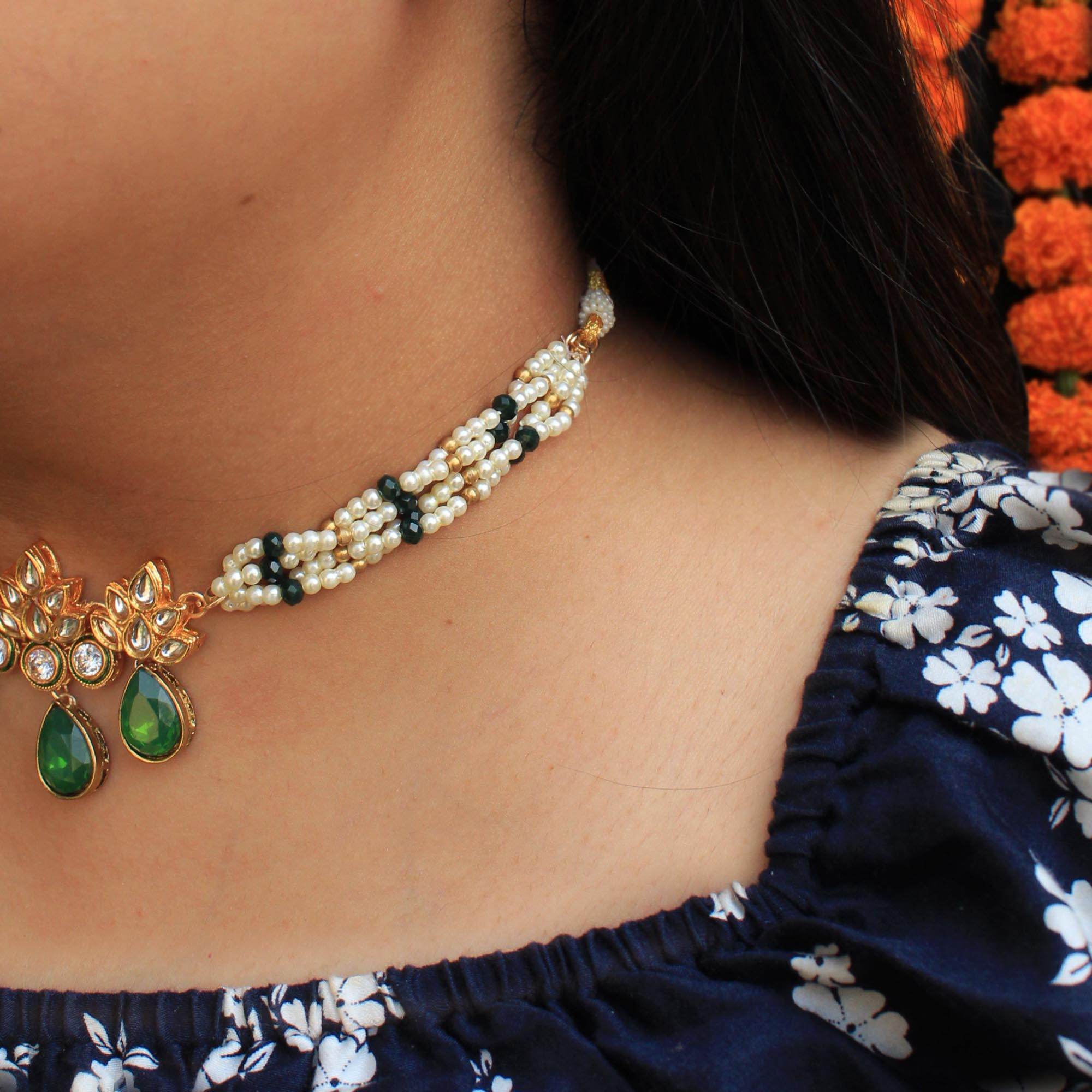 Kundan choker set in gold-tone with matching earrings and long bridal necklace, perfect for wedding functions , festive and bridal wear