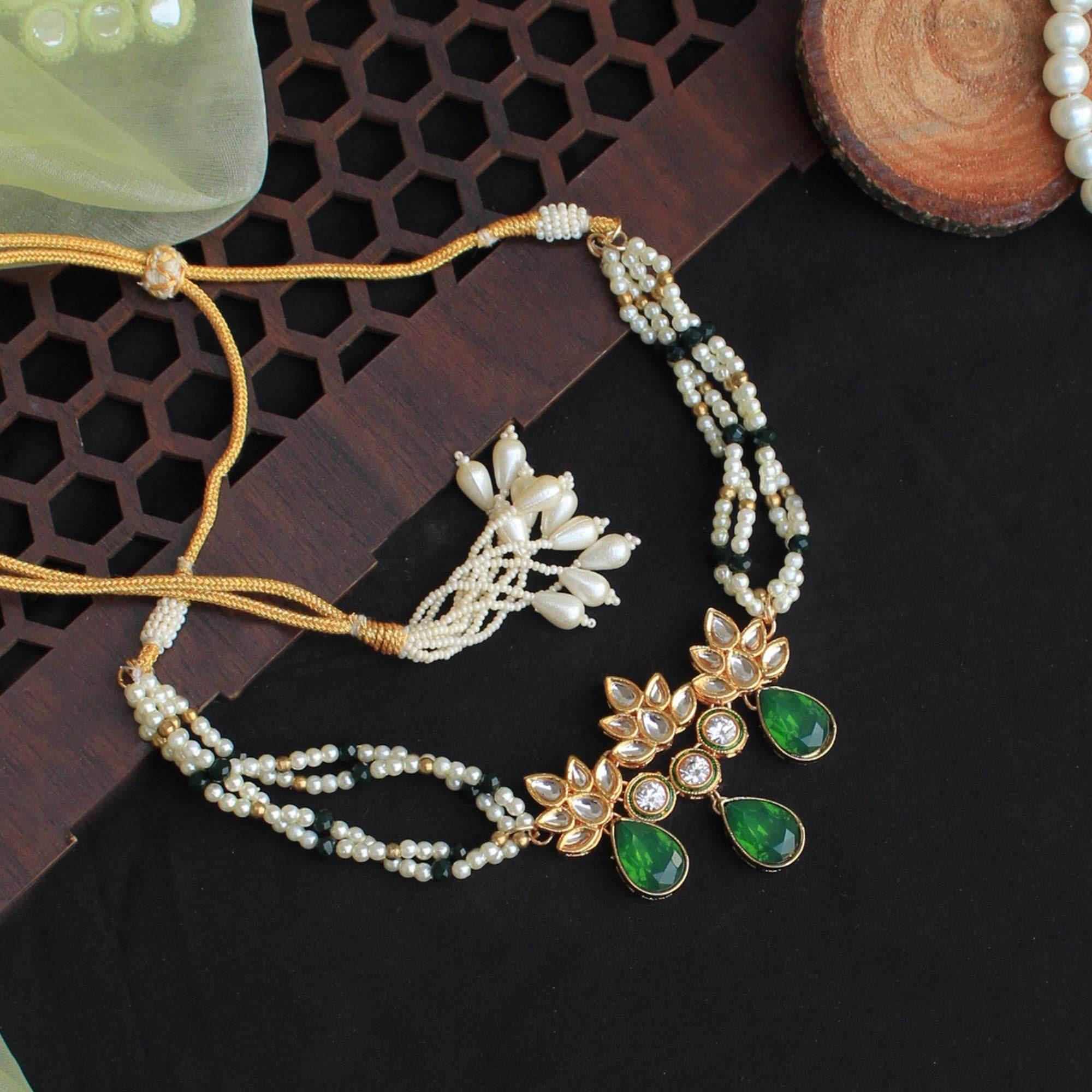 Kundan choker set in gold-tone with matching earrings and long bridal necklace, perfect for wedding functions , festive and bridal wear