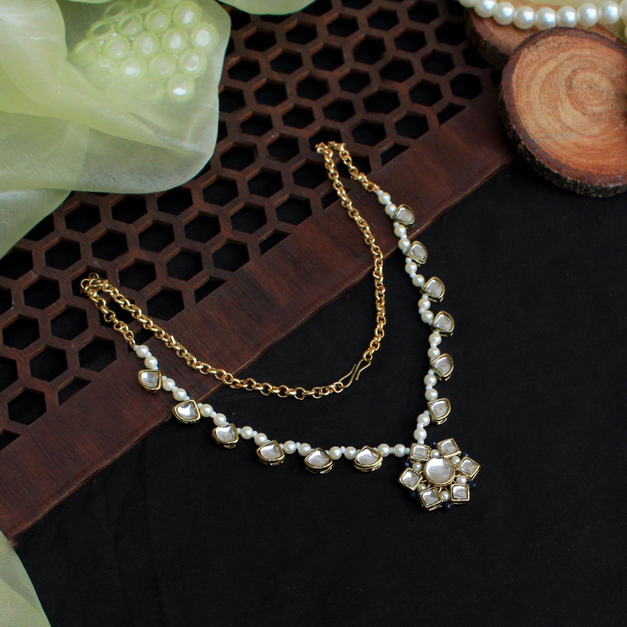 Kundan choker set in gold-tone with matching earrings and long bridal necklace, perfect for wedding functions , festive and bridal wear