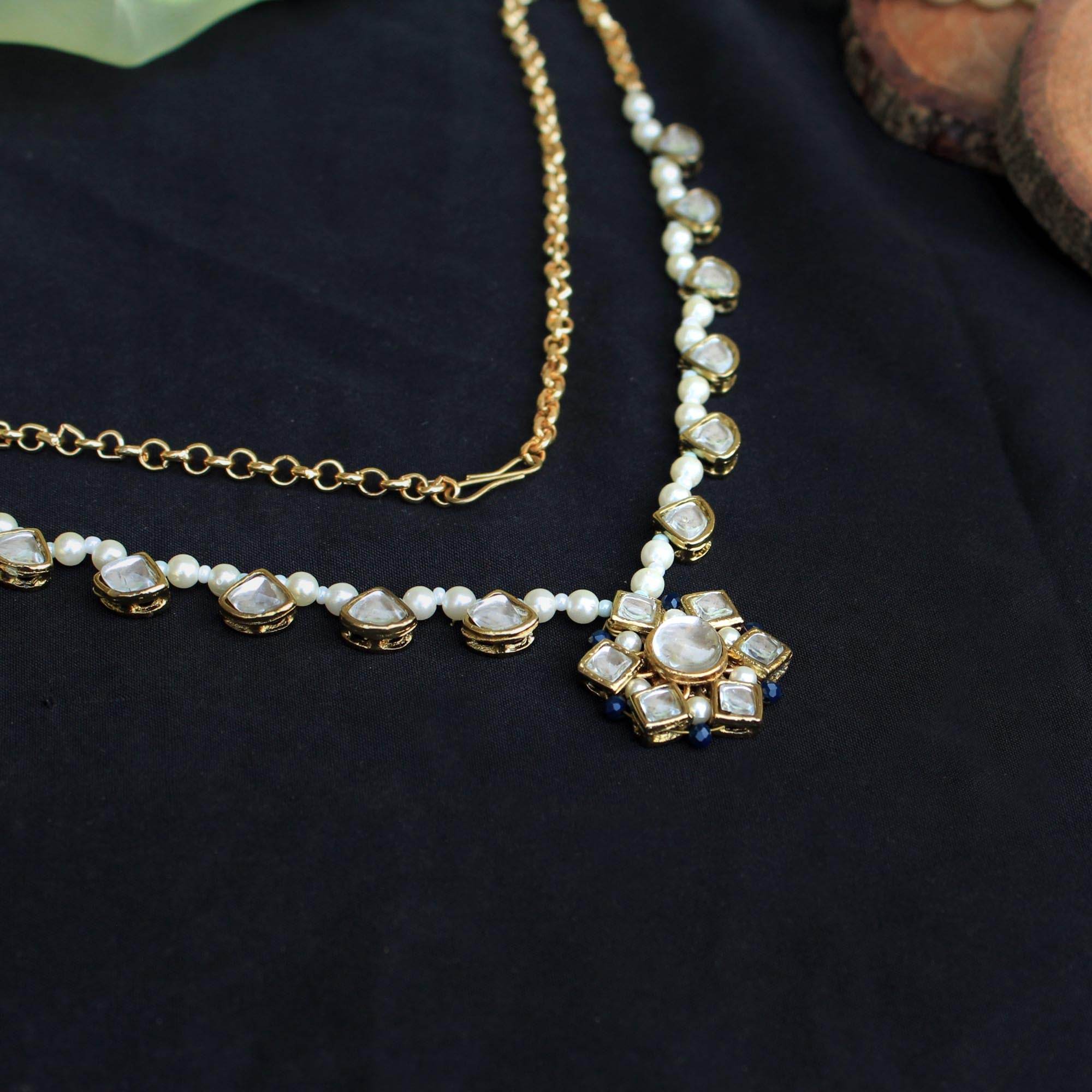 Kundan choker set in gold-tone with matching earrings and long bridal necklace, perfect for wedding functions , festive and bridal wear
