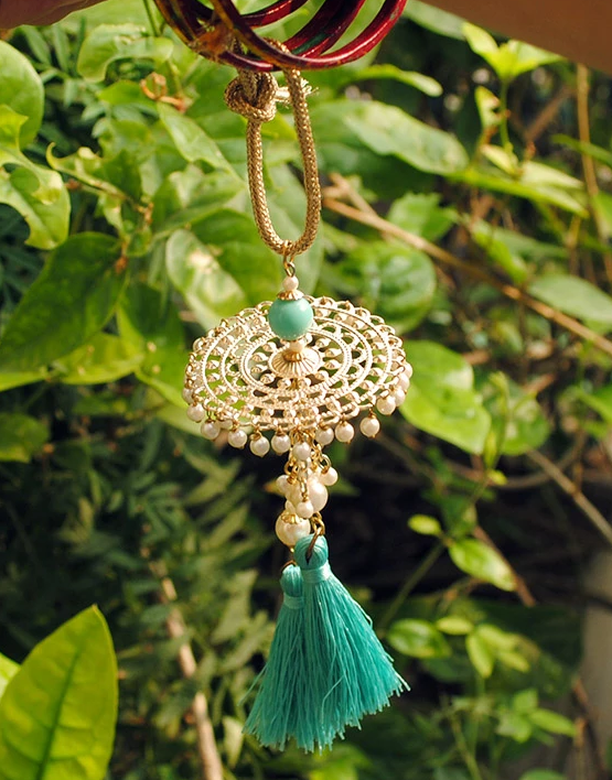 Golden Disc with Turquoise Tassel Lumba