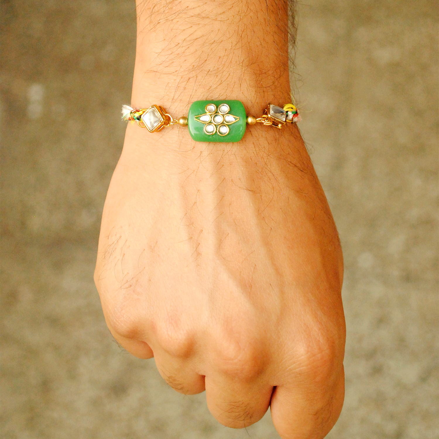 Green Kundan Knot Rakhi And Bhabhi Lumba Combo