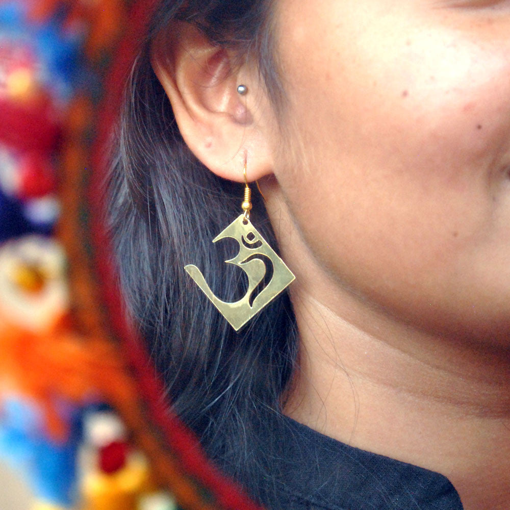 Traditional Kundan earrings in gold-tone, perfect for weddings and festive wear