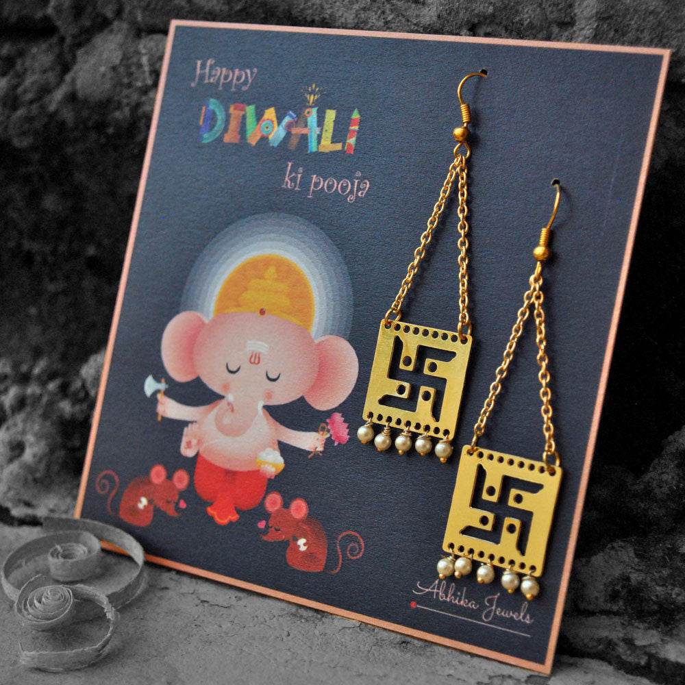 Traditional Kundan earrings in gold-tone, perfect for weddings and festive wear