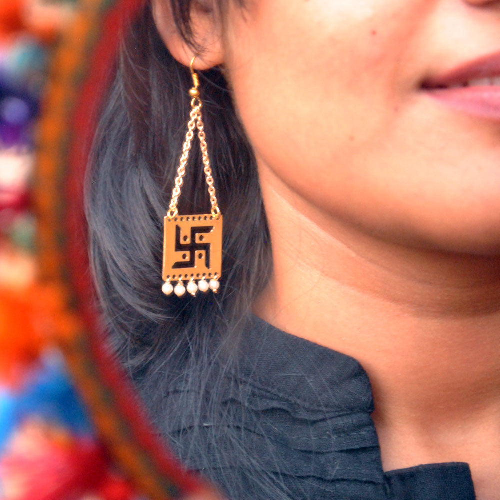 Traditional Kundan earrings in gold-tone, perfect for weddings and festive wear