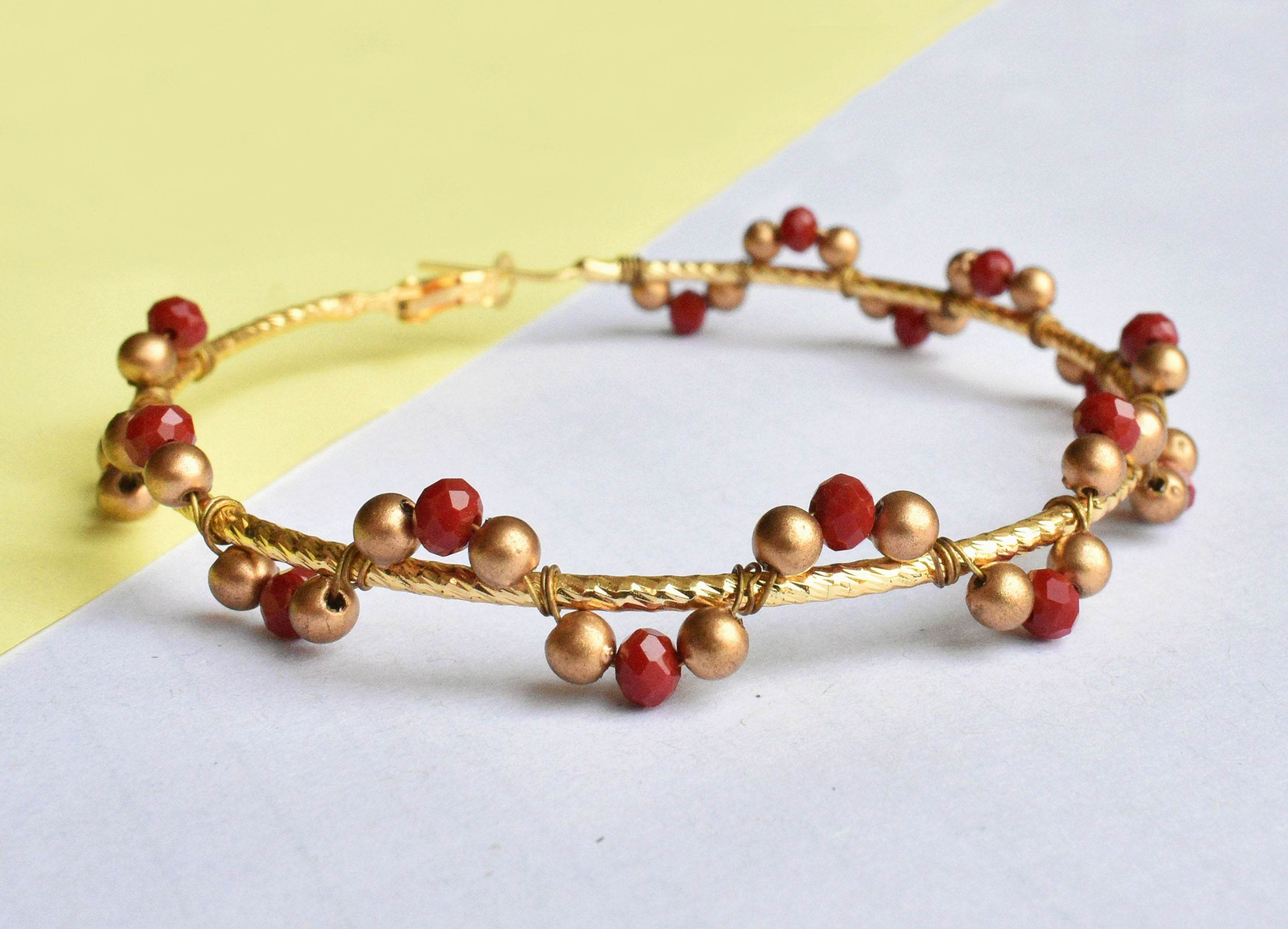 Traditional Kundan earrings in gold-tone, perfect for weddings and festive wear