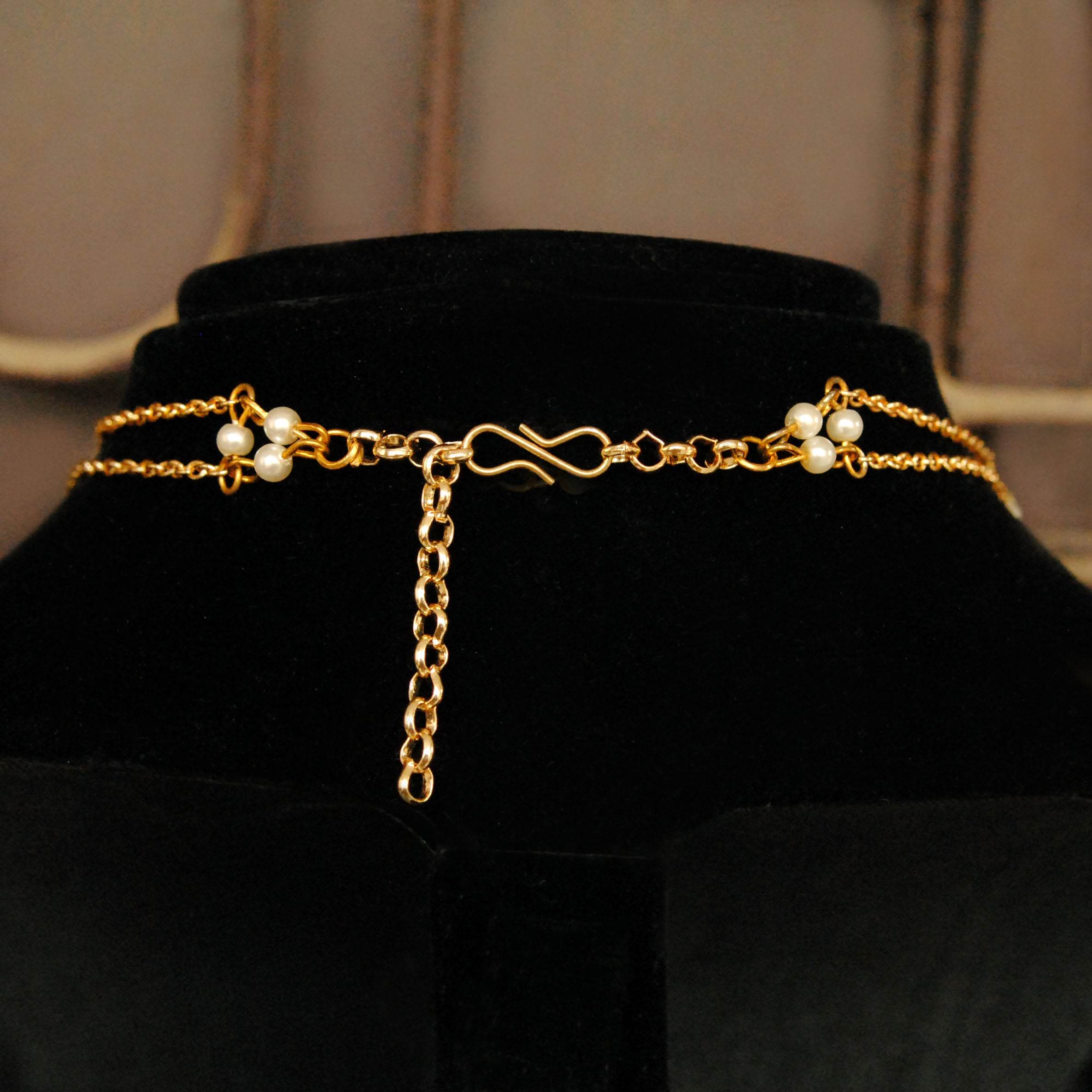 Kundan choker set in gold-tone with matching earrings and long bridal necklace, perfect for wedding functions , festive and bridal wear