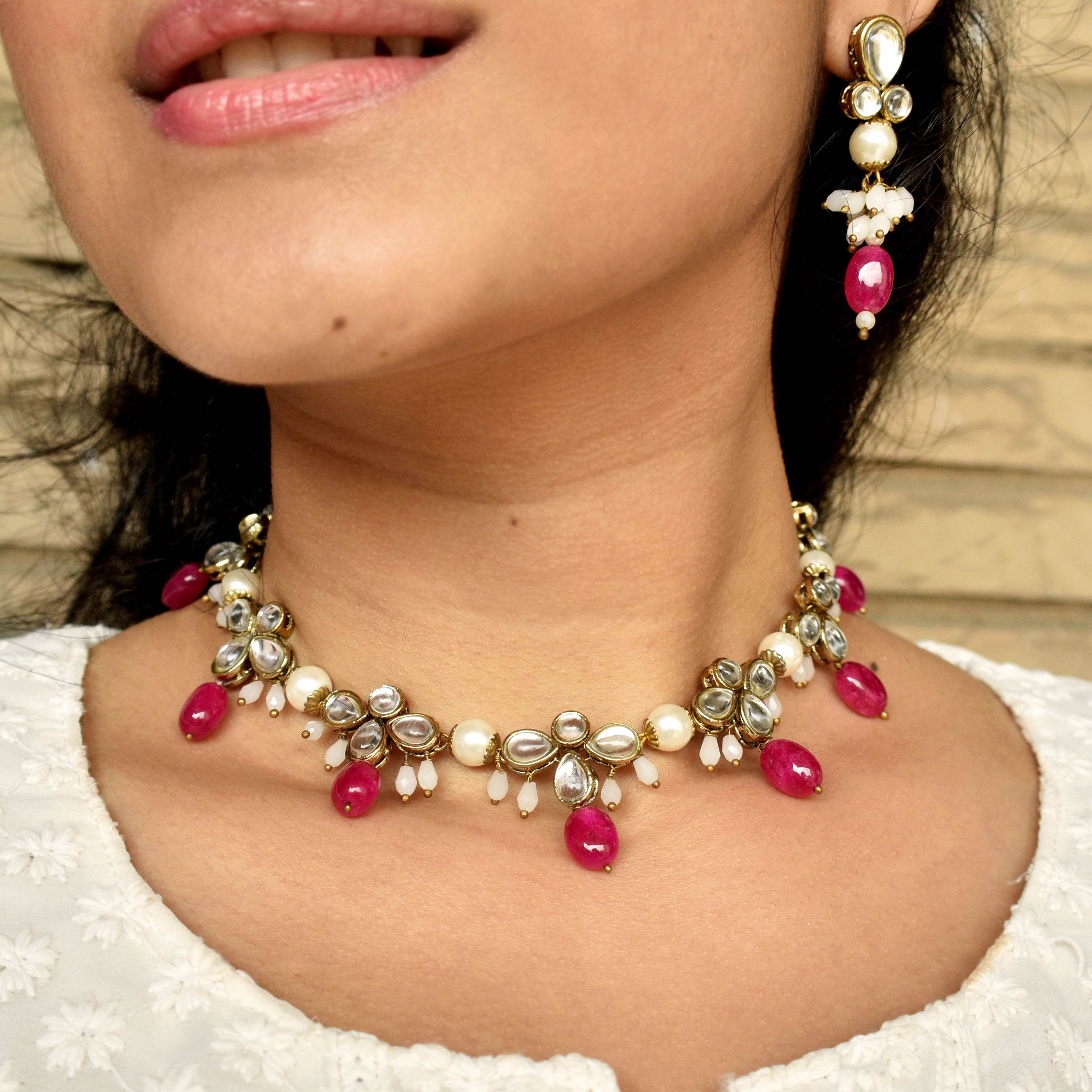 Kundan choker set in gold-tone with matching earrings and long bridal necklace, perfect for wedding functions , festive and bridal wear