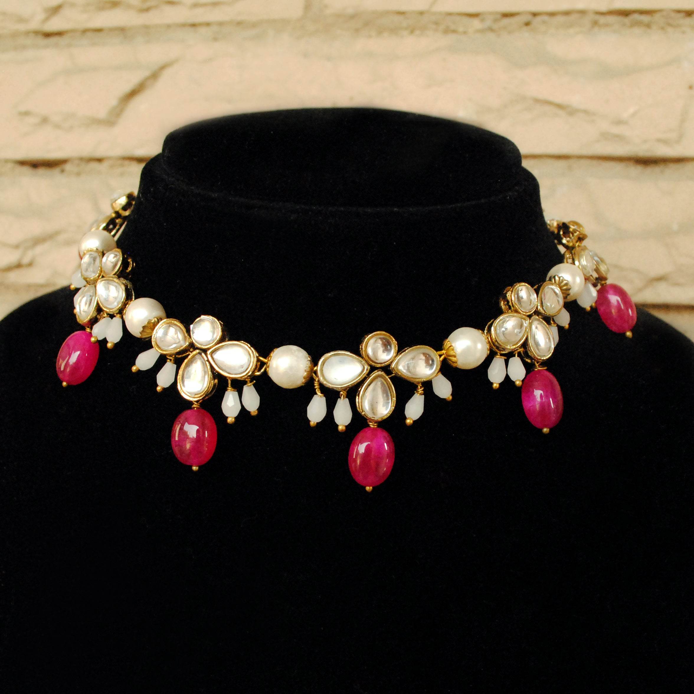 Kundan choker set in gold-tone with matching earrings and long bridal necklace, perfect for wedding functions , festive and bridal wear