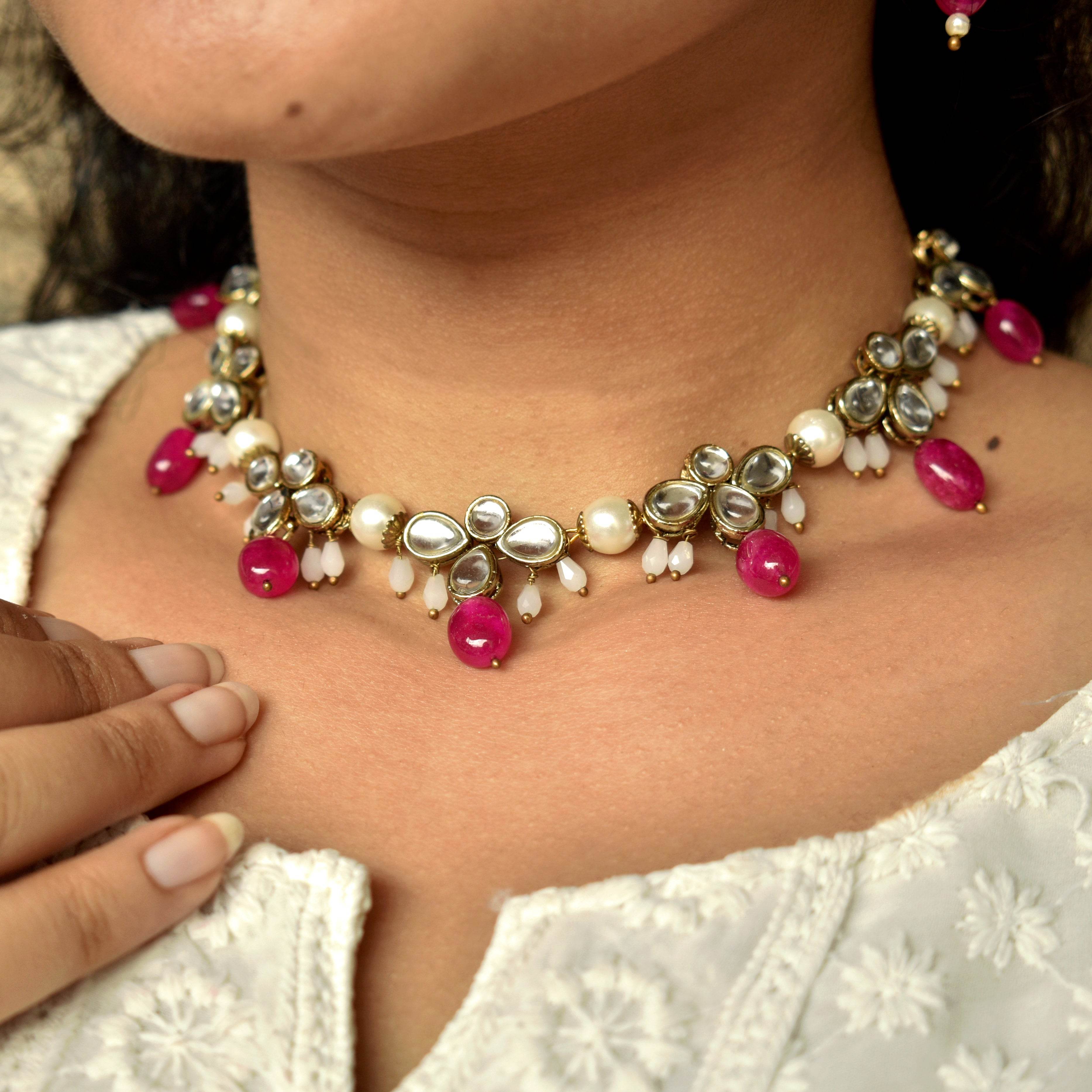 Kundan choker set in gold-tone with matching earrings and long bridal necklace, perfect for wedding functions , festive and bridal wear